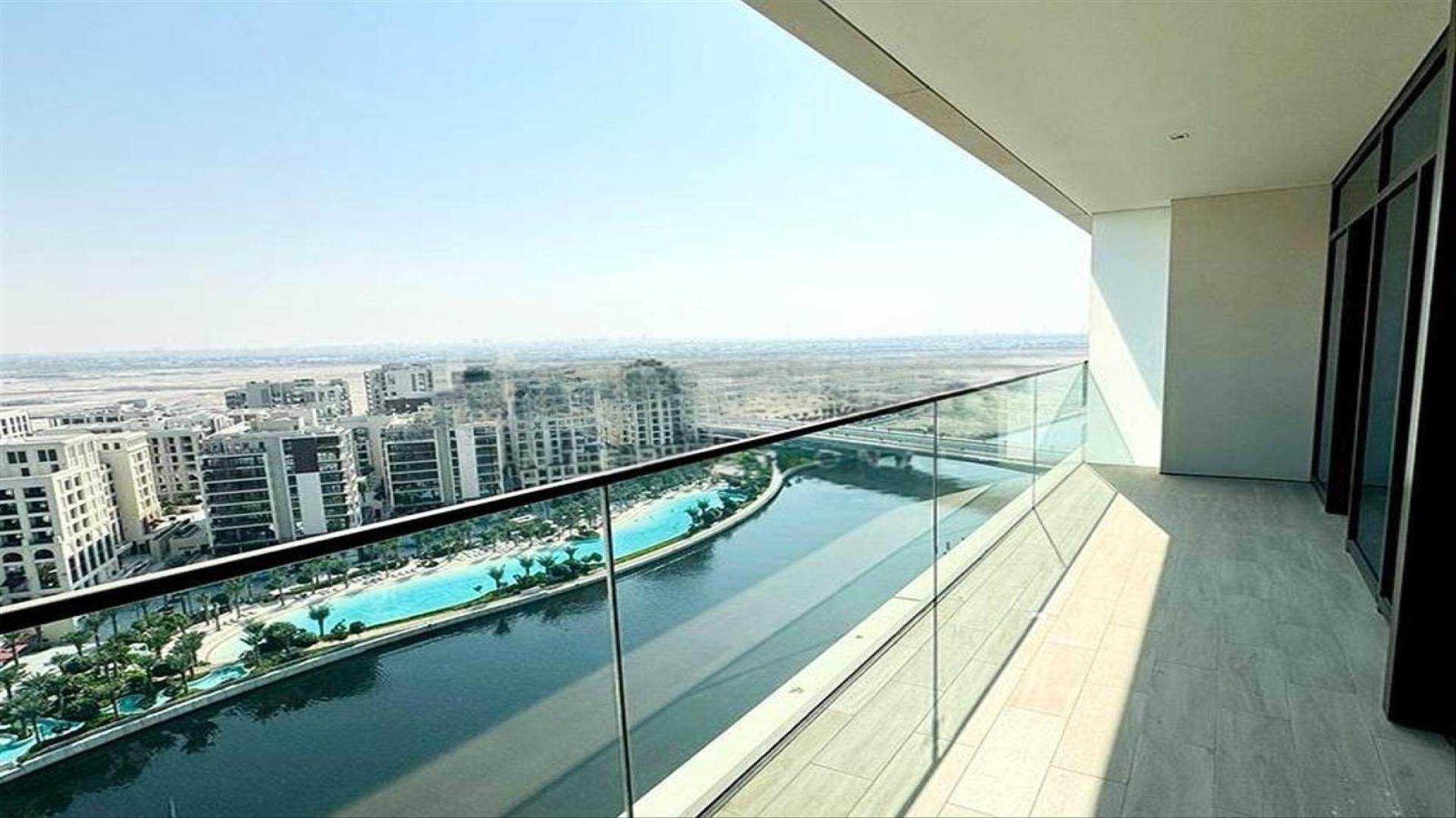 Modern bathroom with glass shower in Dubai Creek Harbour apartment for rent