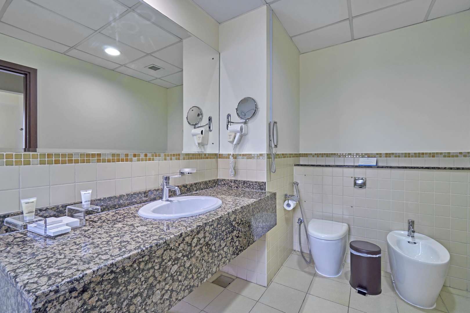 Bright bedroom with seating area in Roda Amwaj Towers apartment, Jumeirah Beach Residence