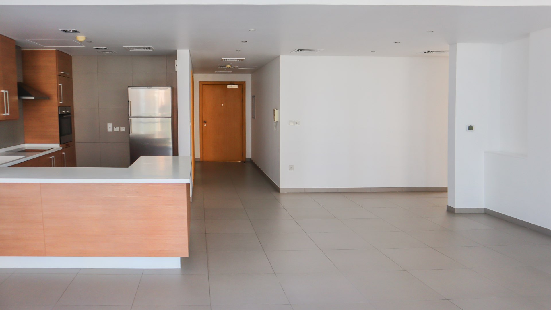 Contemporary Ariyana Tower apartment interior with large windows overlooking Dubai Marina community