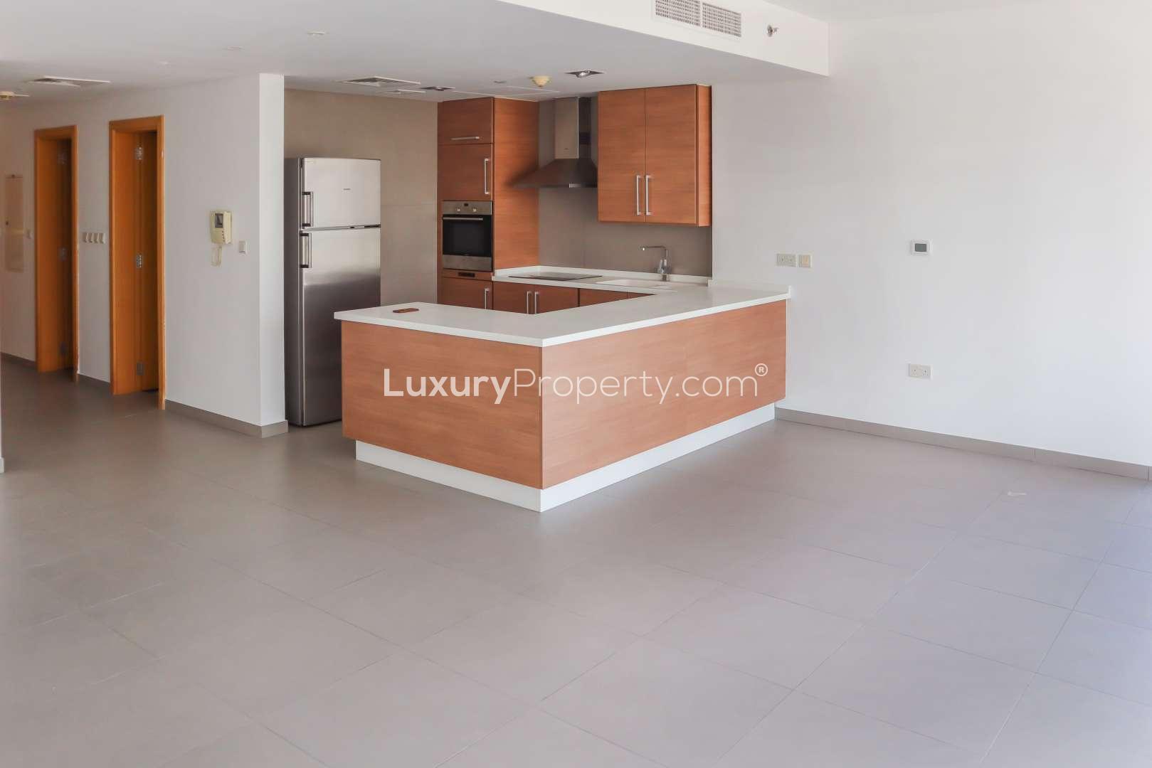 Modern kitchen and living area in 2-bedroom apartment, Ariyana Tower, Dubai Marina