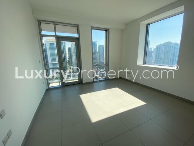 Modern kitchen and living area in 2-bedroom apartment, Ariyana Tower, Dubai Marina