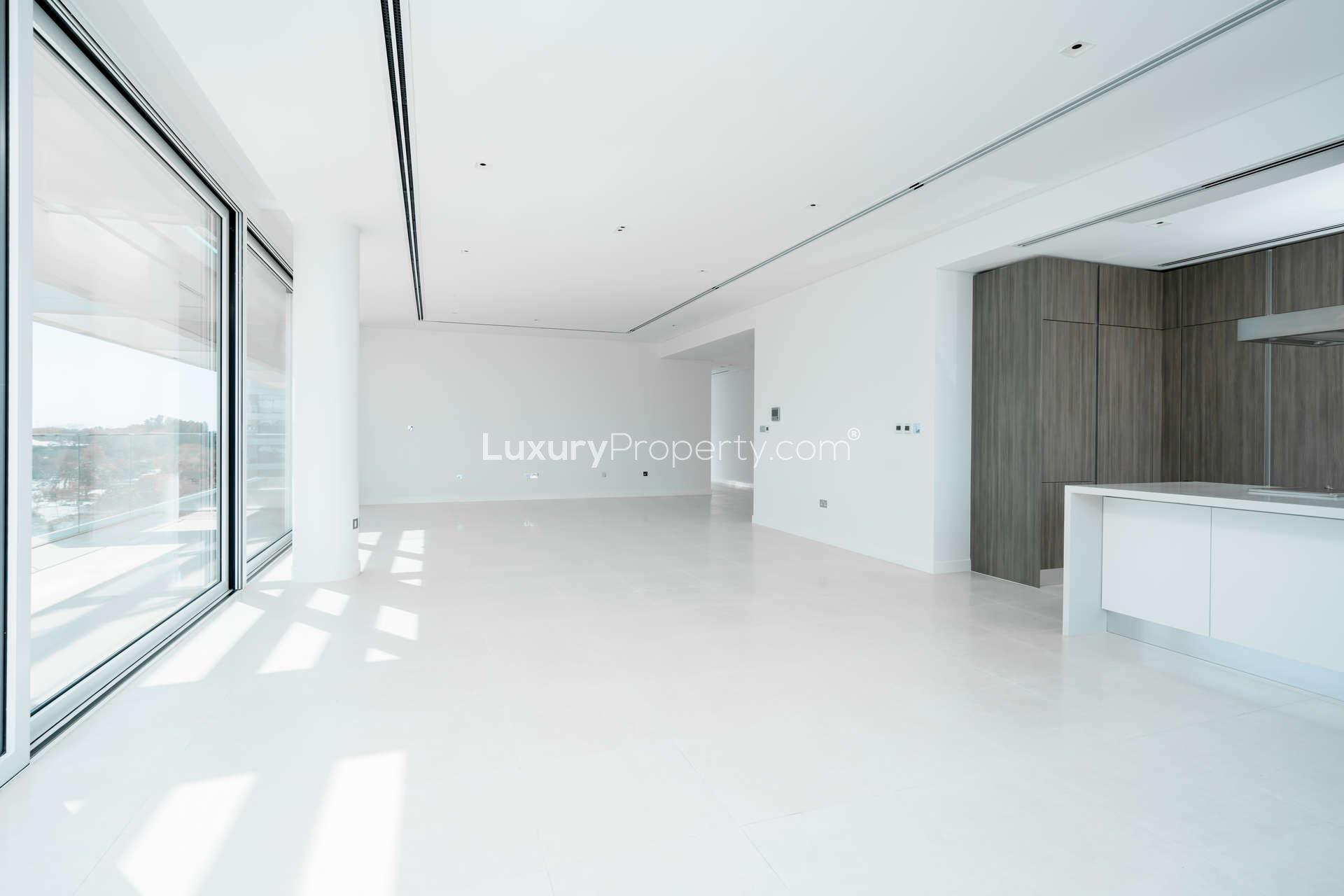 Empty room with large windows in 2-bedroom apartment, Ashjar, Al Barari, for rent