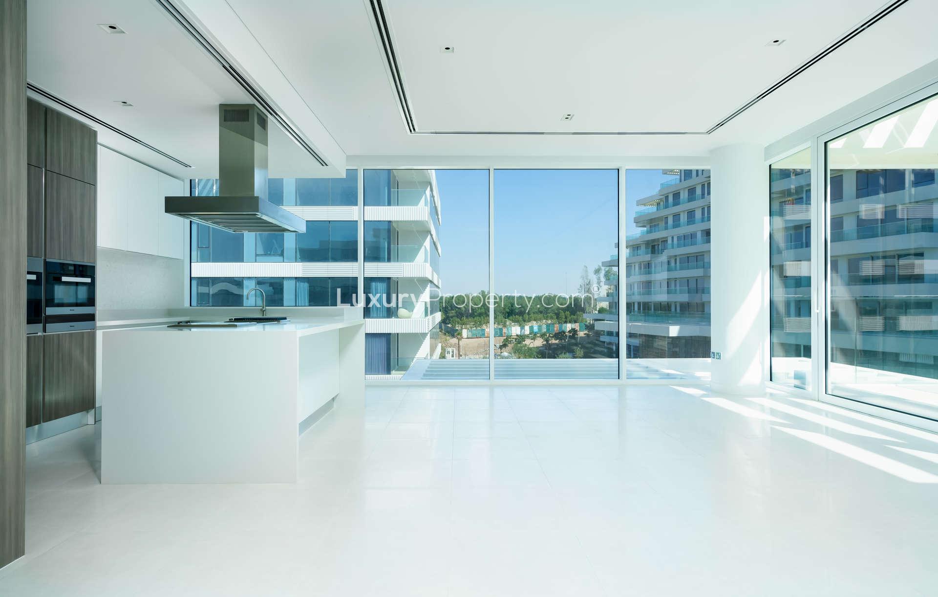 Bright empty room with large window in Ashjar, Al Barari apartment for rent