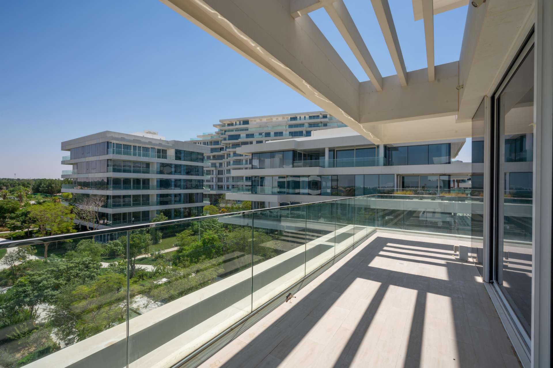 Spacious balcony view from 2-bedroom apartment in Ashjar, Al Barari for rent