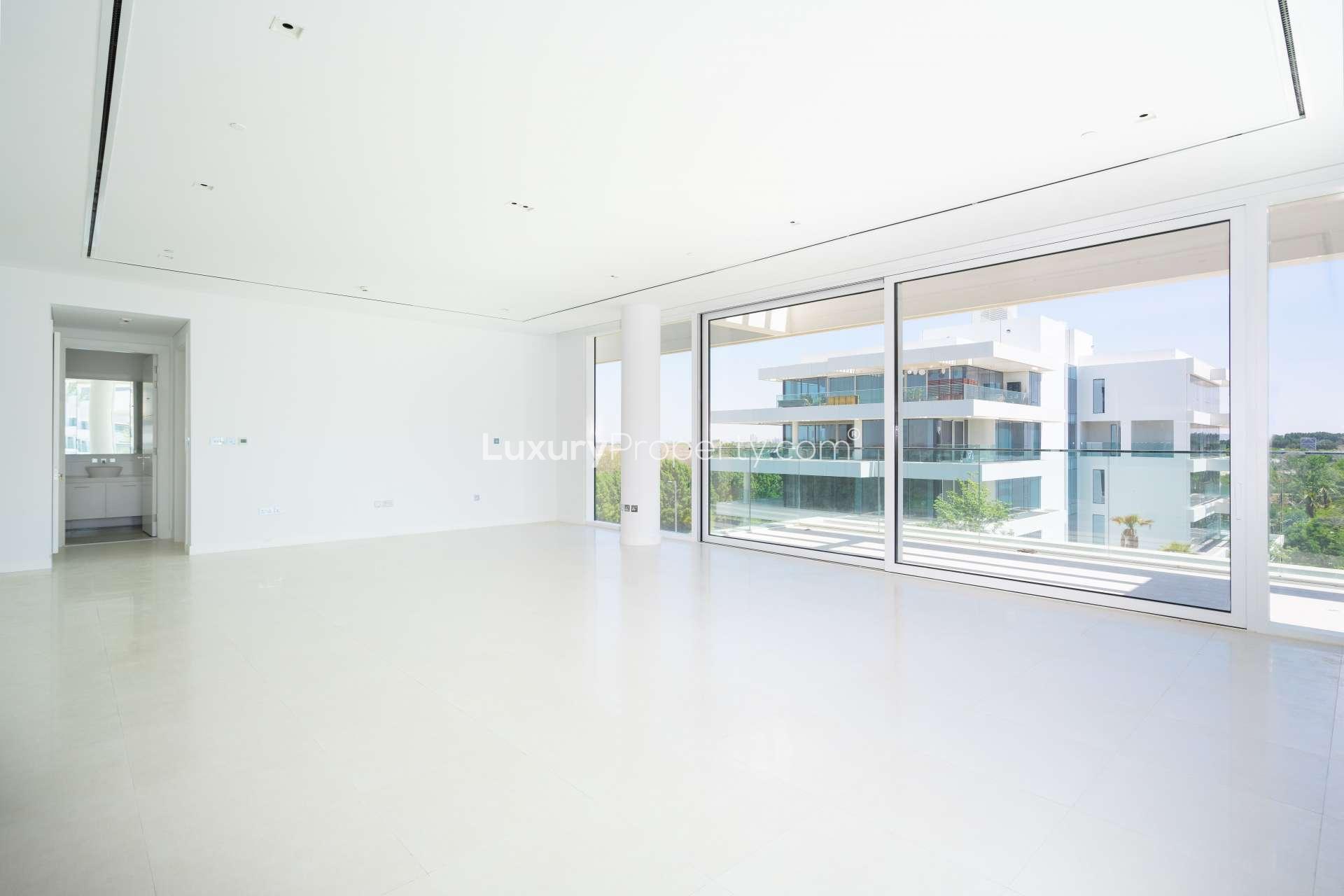 Modern 2-bedroom apartment exterior with lush greenery in Ashjar, Al Barari community