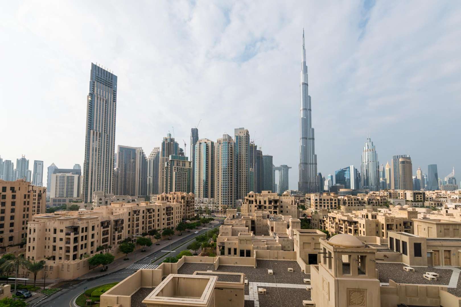 "Stunning Burj Khalifa view from 2-bedroom apartment in Reehan, Old Town, Downtown Dubai.",Empty room with tiled floor and Burj Khalifa view in Downtown Dubai apartment