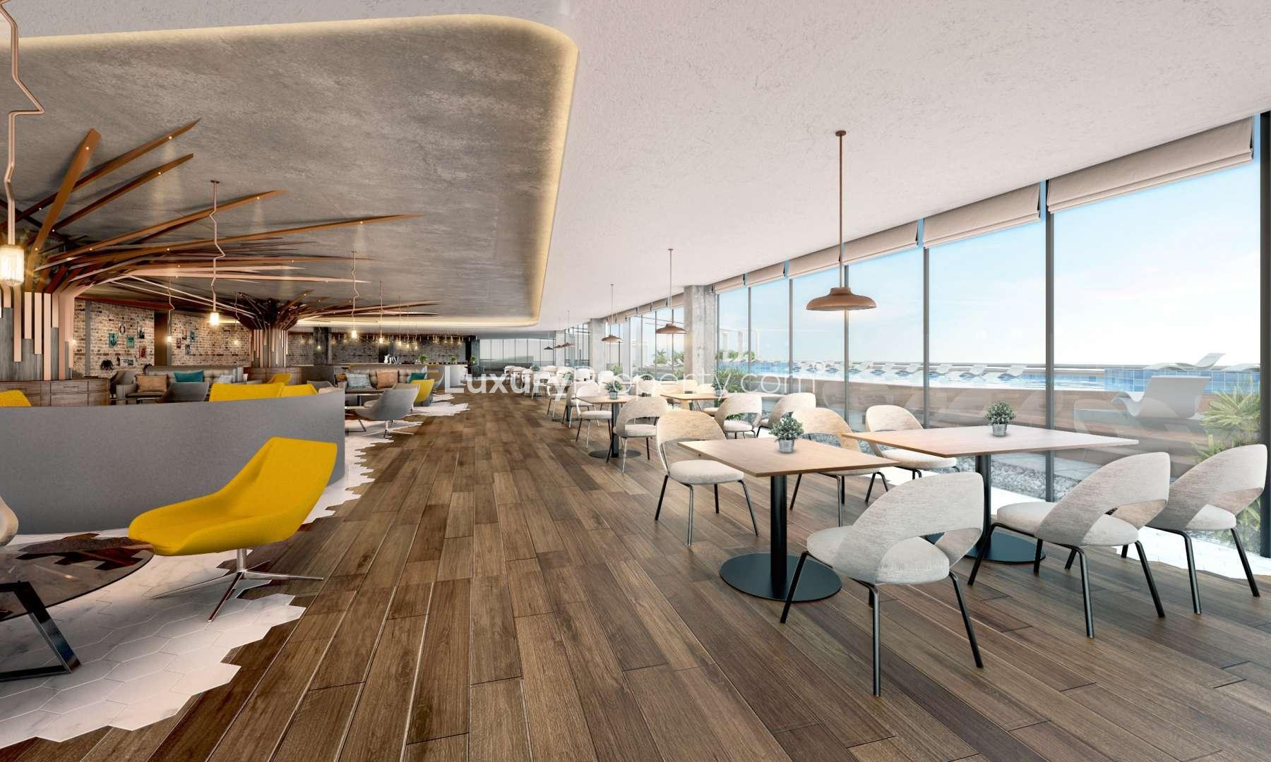 Elegant bedroom in two-bedroom apartment, Avani Palm View, Dubai Media City, with cityscape view