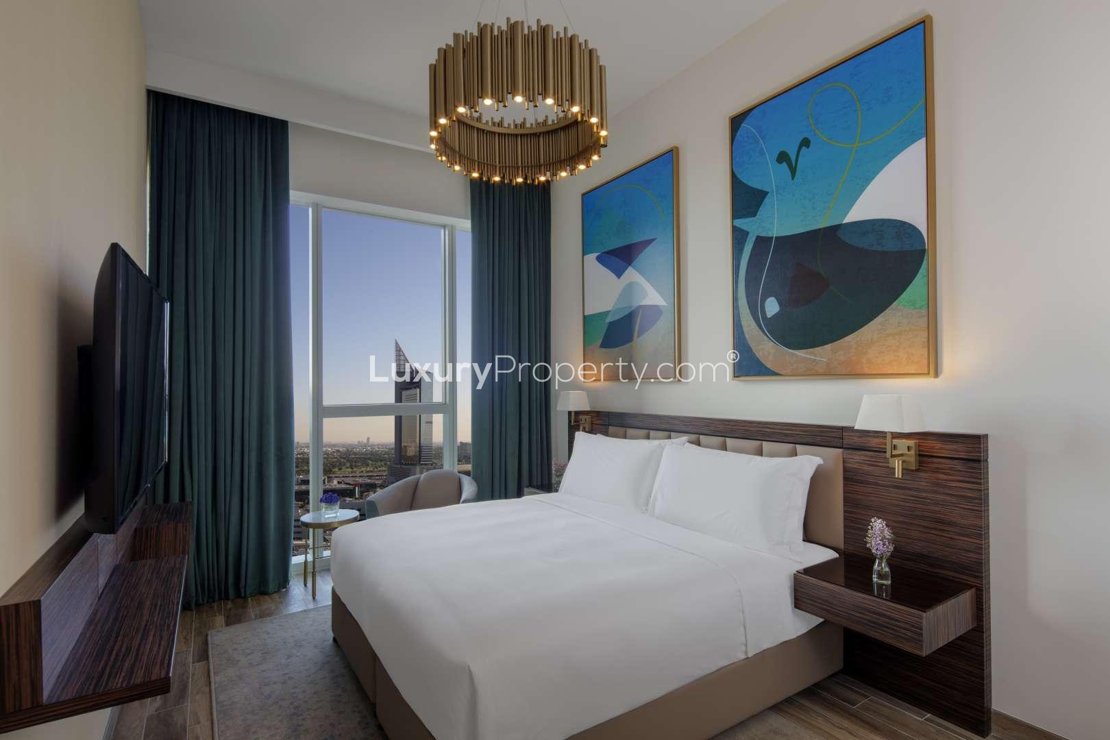 Modern living room and kitchen in 2-bedroom apartment, Avani Palm View, Dubai Media City