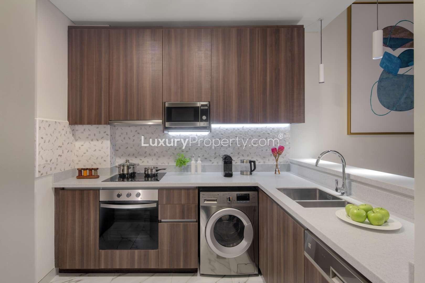 Modern living room and dining area in 2-bedroom apartment, Avani Palm View, Dubai Media City