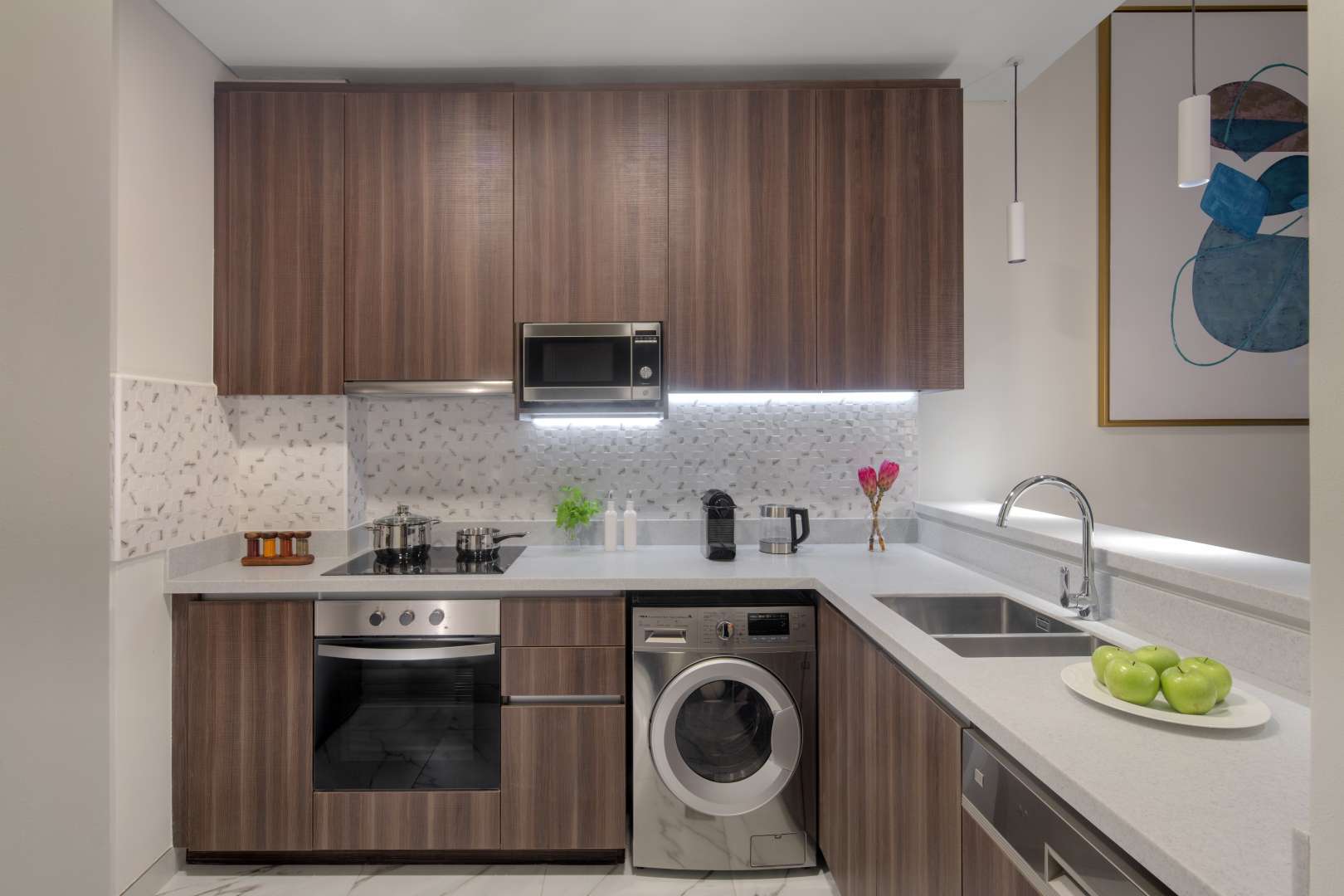 Modern living room and dining area in 2-bedroom apartment, Avani Palm View, Dubai Media City