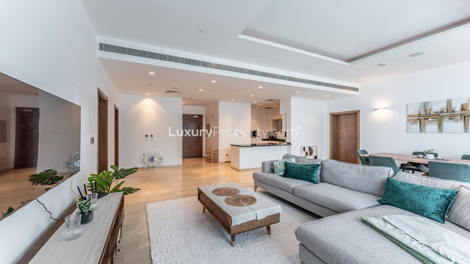 Elegant living room in 2-bedroom apartment, Oceana, Palm Jumeirah, with modern decor and balcony view