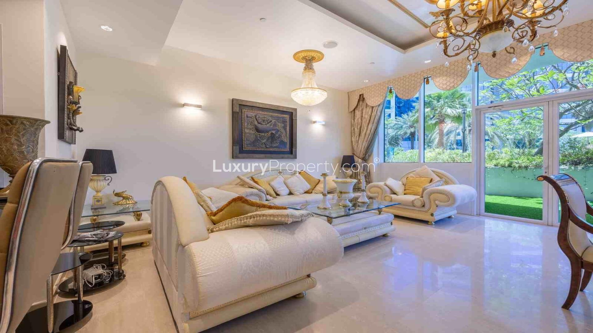 Luxurious living room in Oceana apartment, Palm Jumeirah, featuring elegant decor and modern furnishings