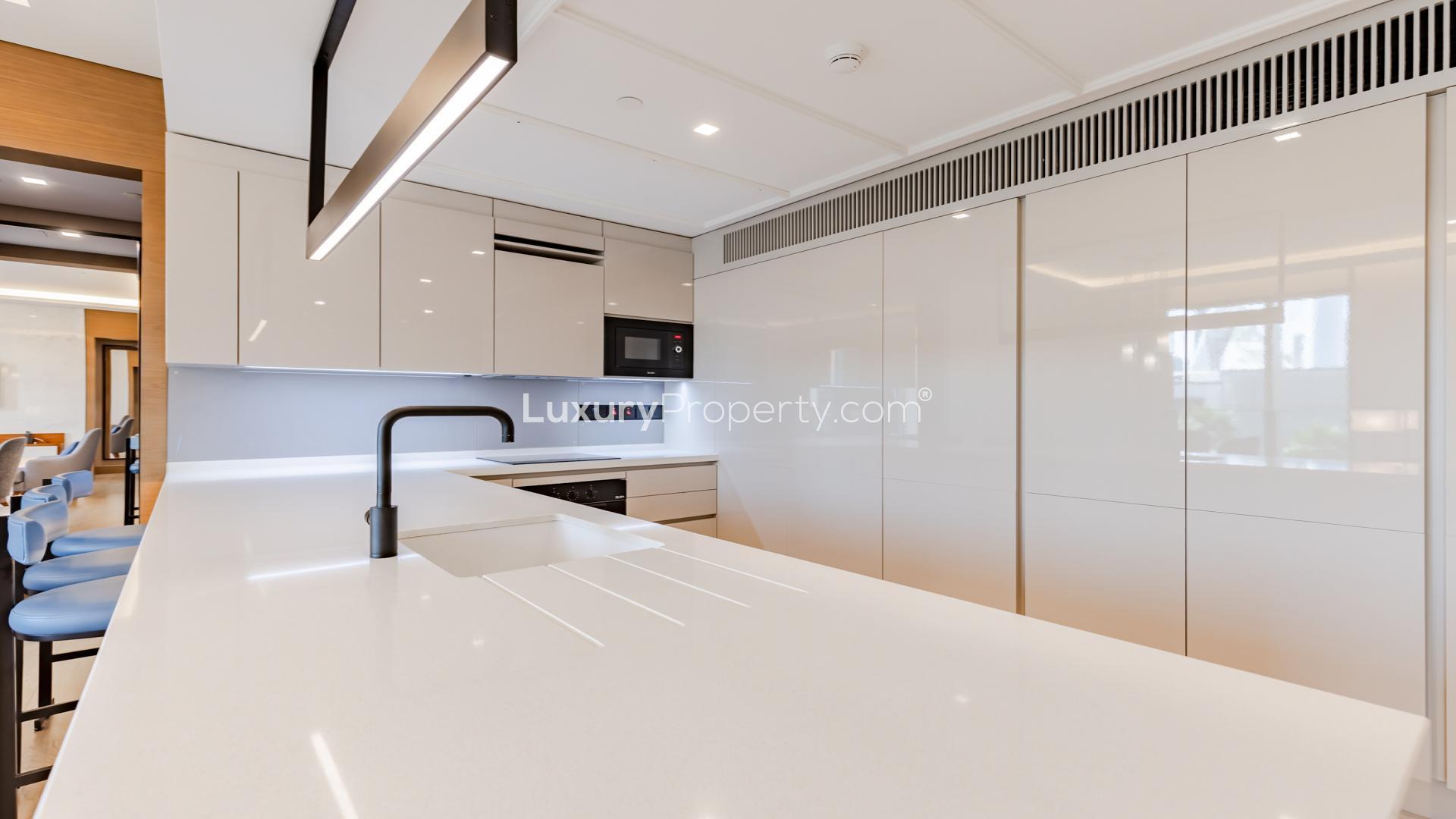 Luxurious living room in 2-bedroom apartment, Bluewaters, Dubai, featuring modern furnishings and decor