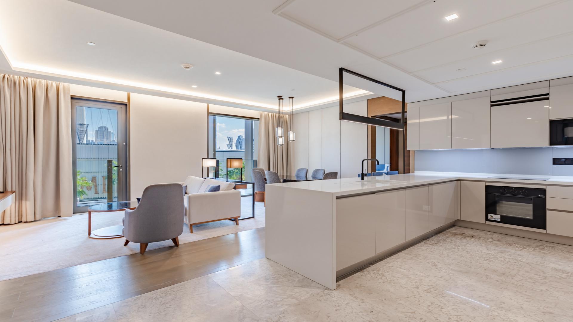 Luxurious living room in 2-bedroom apartment, Bluewaters Dubai, modern furnishings and open layout