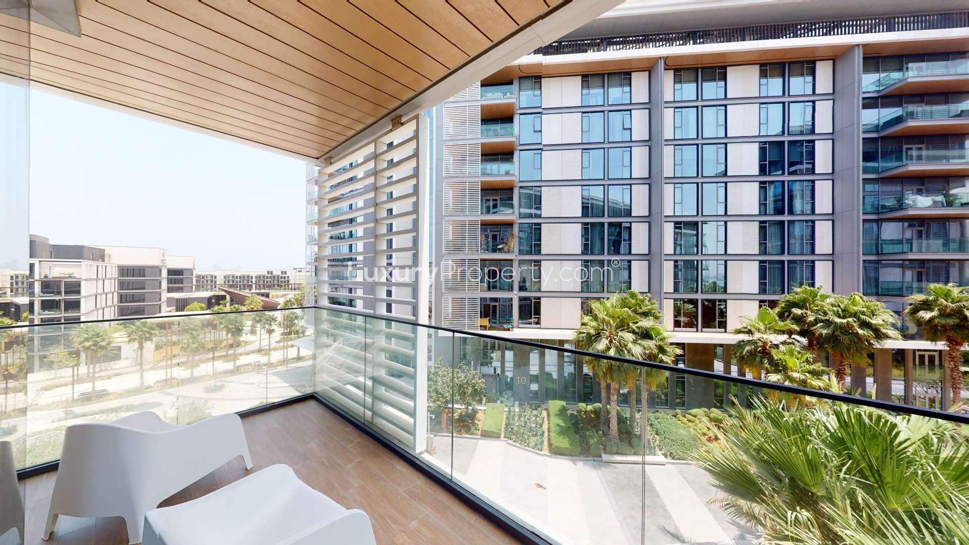 Luxurious living room in Bluewaters Residences apartment with modern decor and large windows