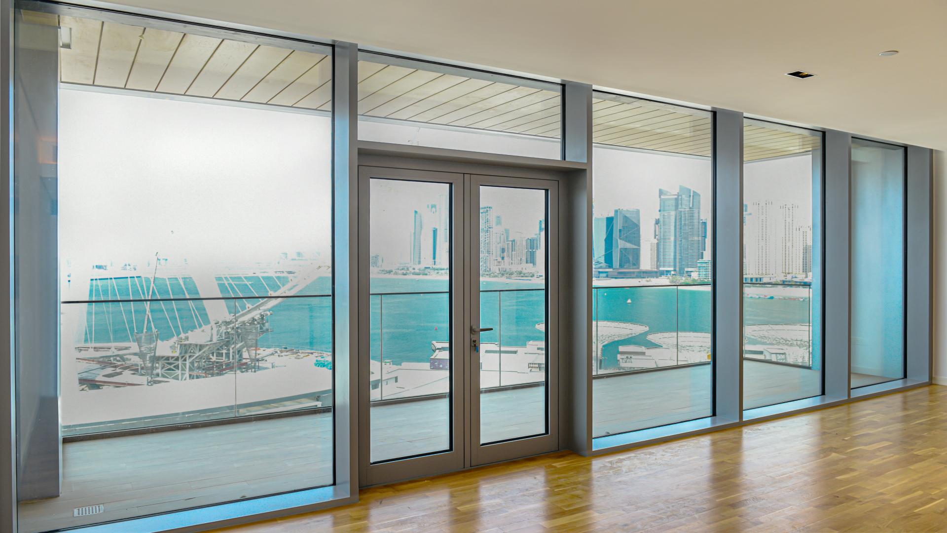 Modern kitchen in Bluewaters apartment, featuring sleek design and spacious layout for rent