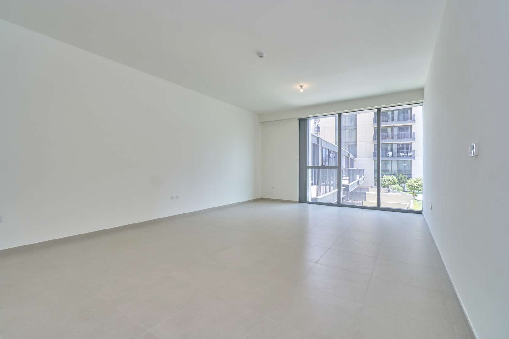 BLVD Heights apartment exterior with lush landscaping in Downtown Dubai, available for rent