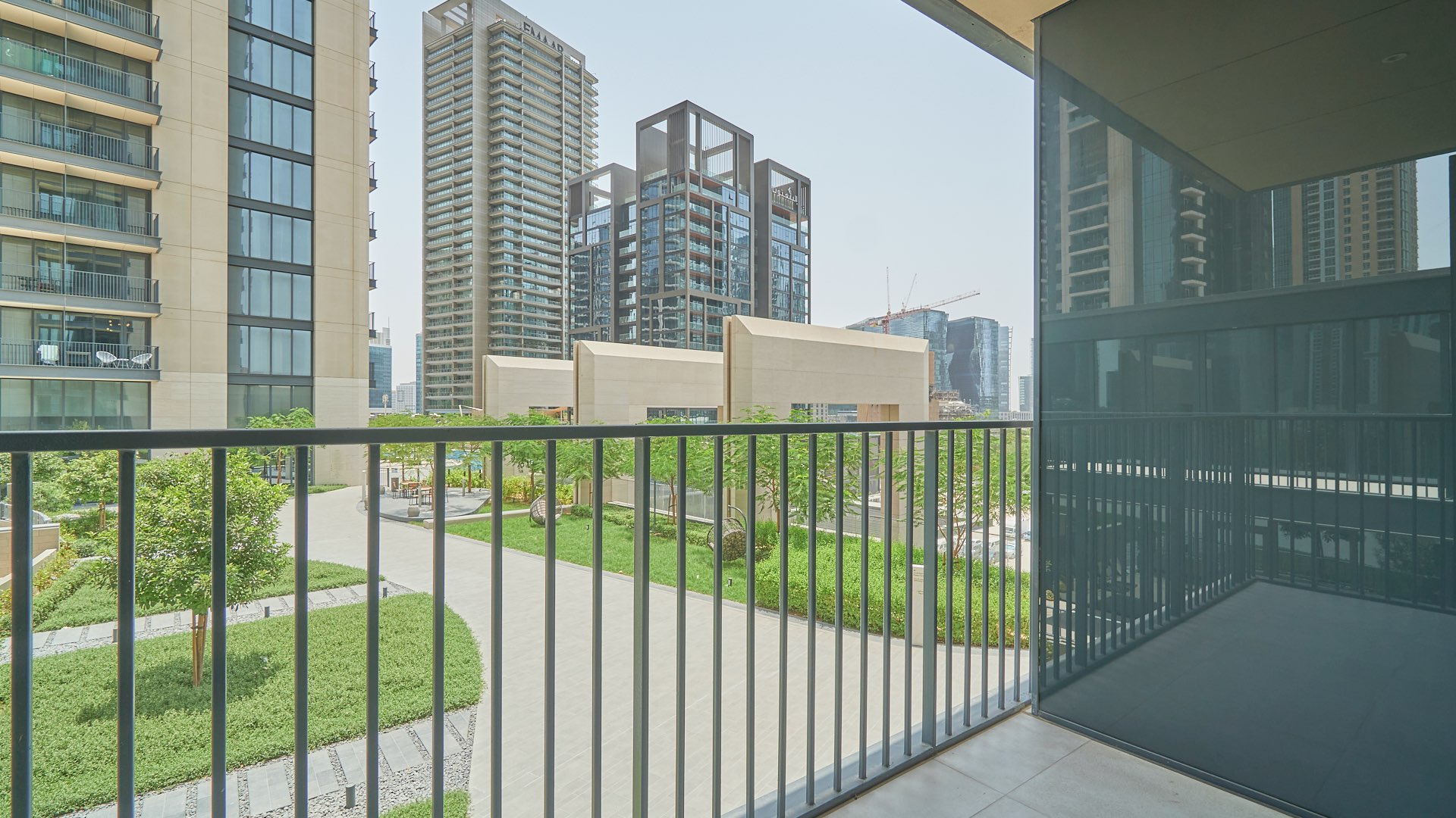 Spacious living area in two-bedroom apartment, BLVD Heights, Downtown Dubai, large windows, bright space