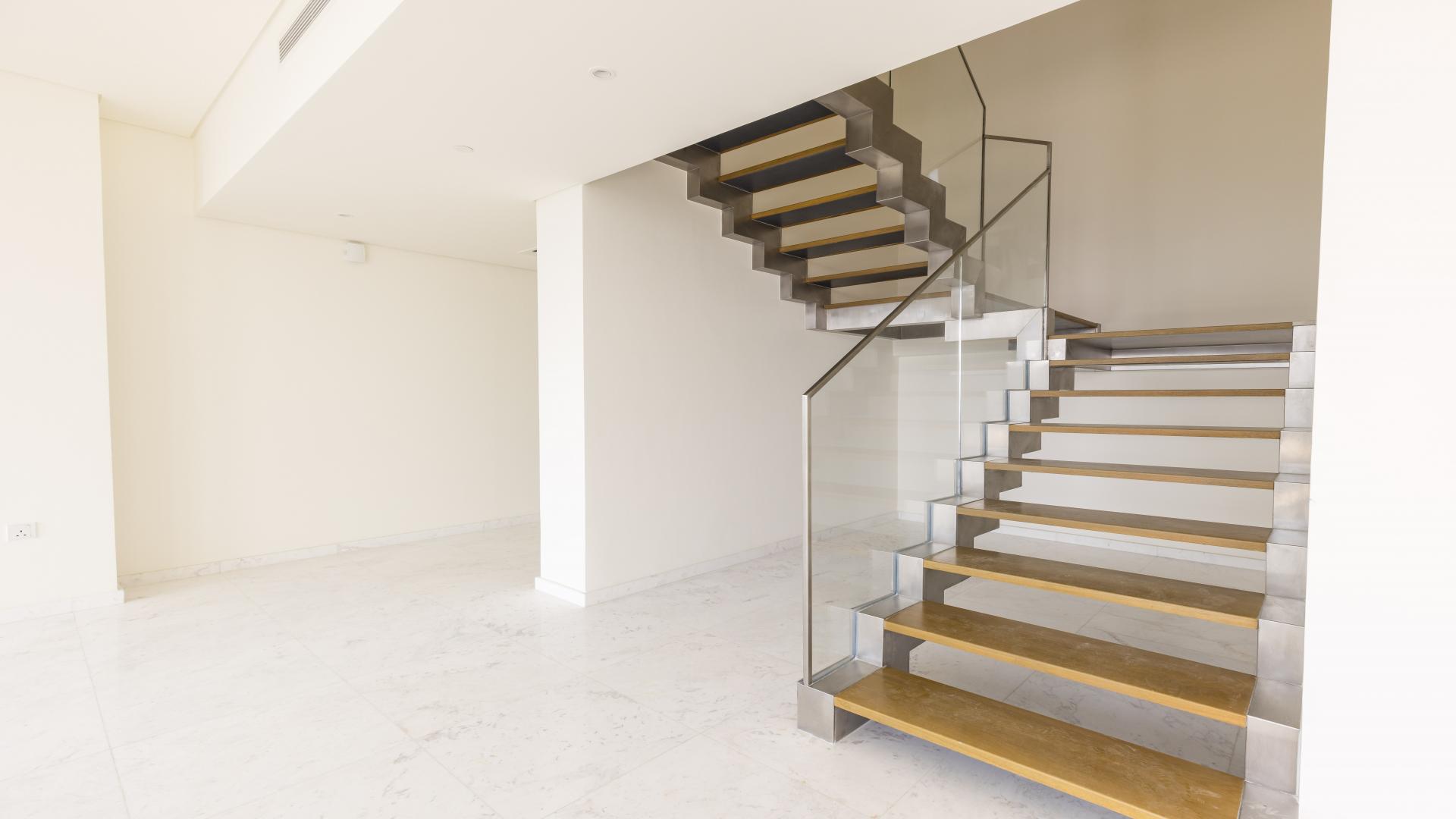 Modern bathroom in high-floor duplex apartment, Downtown Dubai, BLVD Heights. Spacious shower and vanity