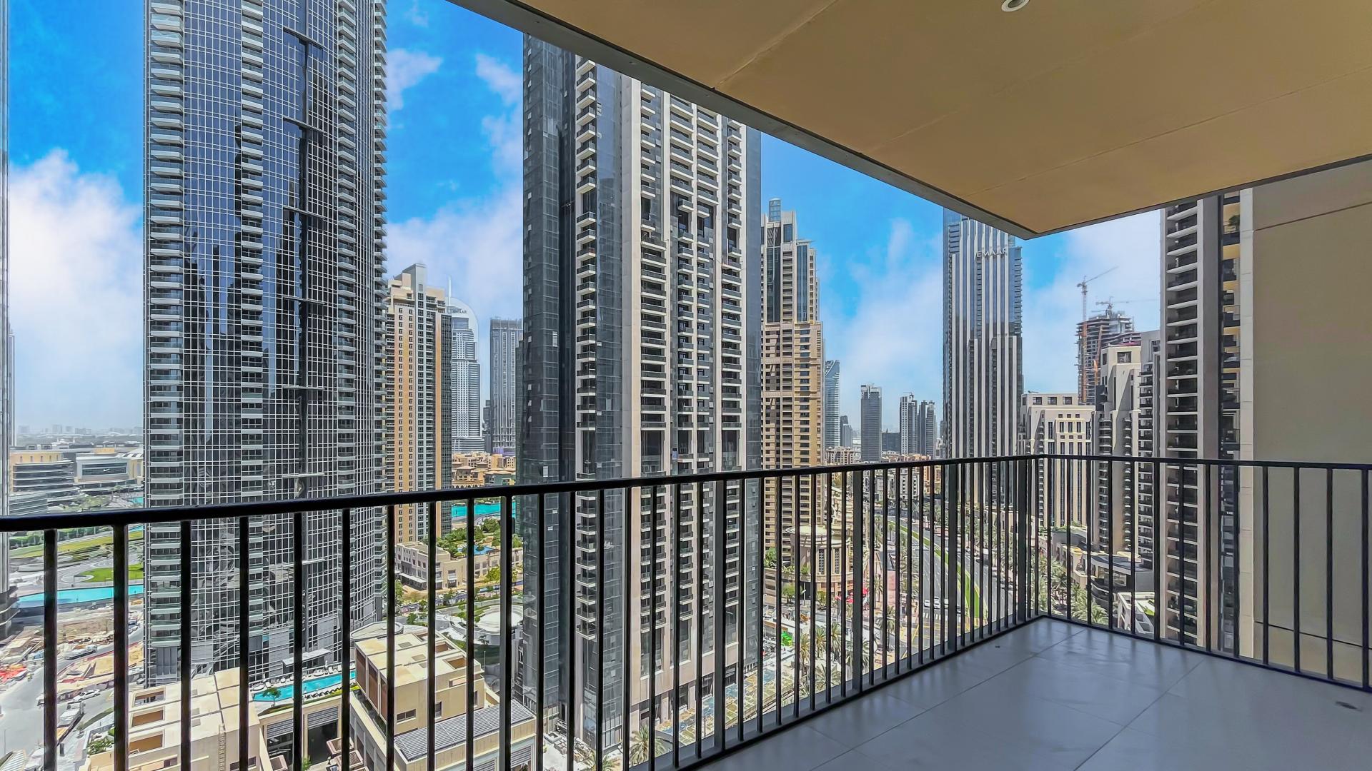 Spacious apartment interior with large windows and boulevard view in Downtown Dubai, BLVD Heights