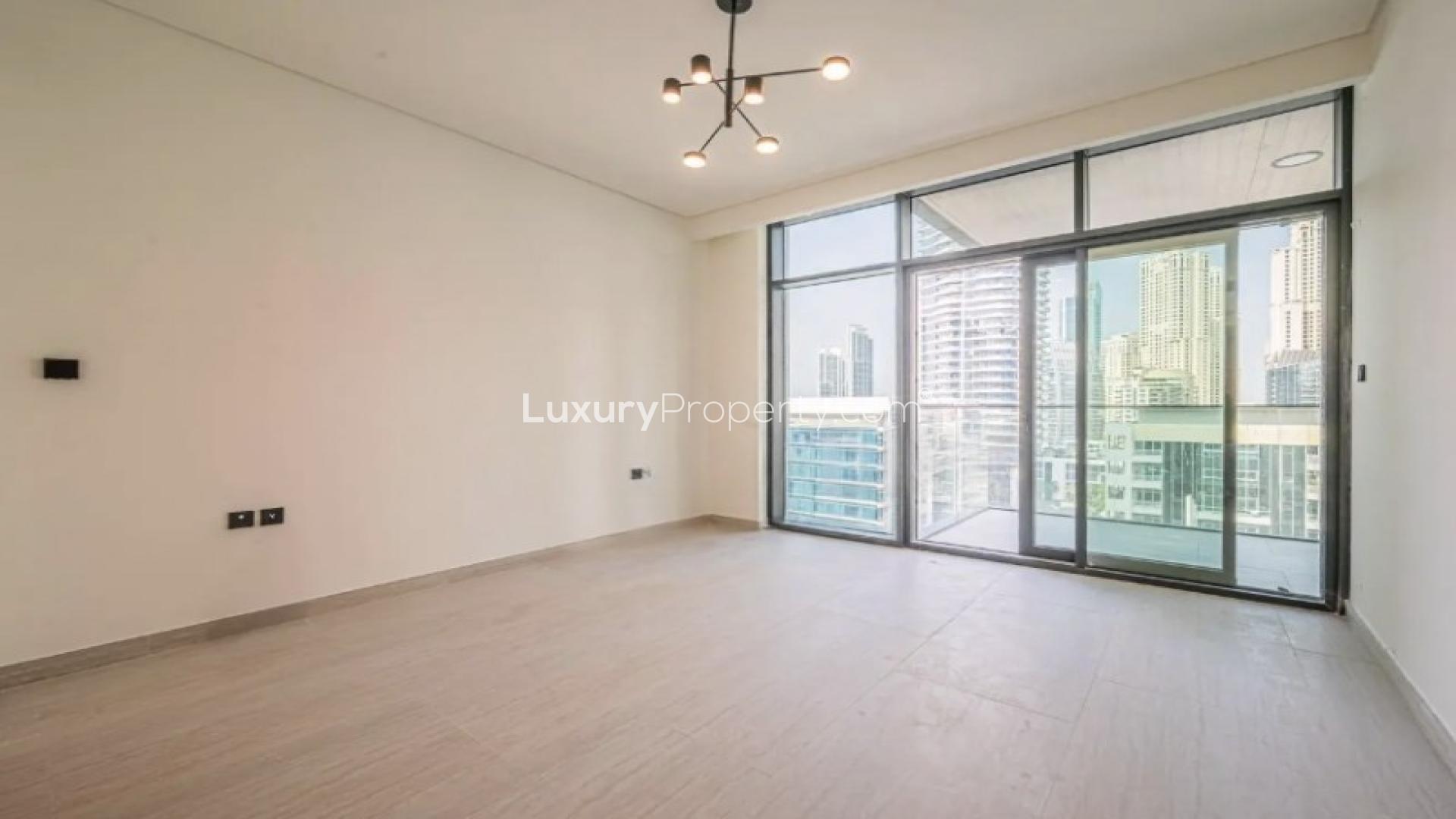Modern kitchen and living area in Dubai Marina apartment for rent, Marina Living community