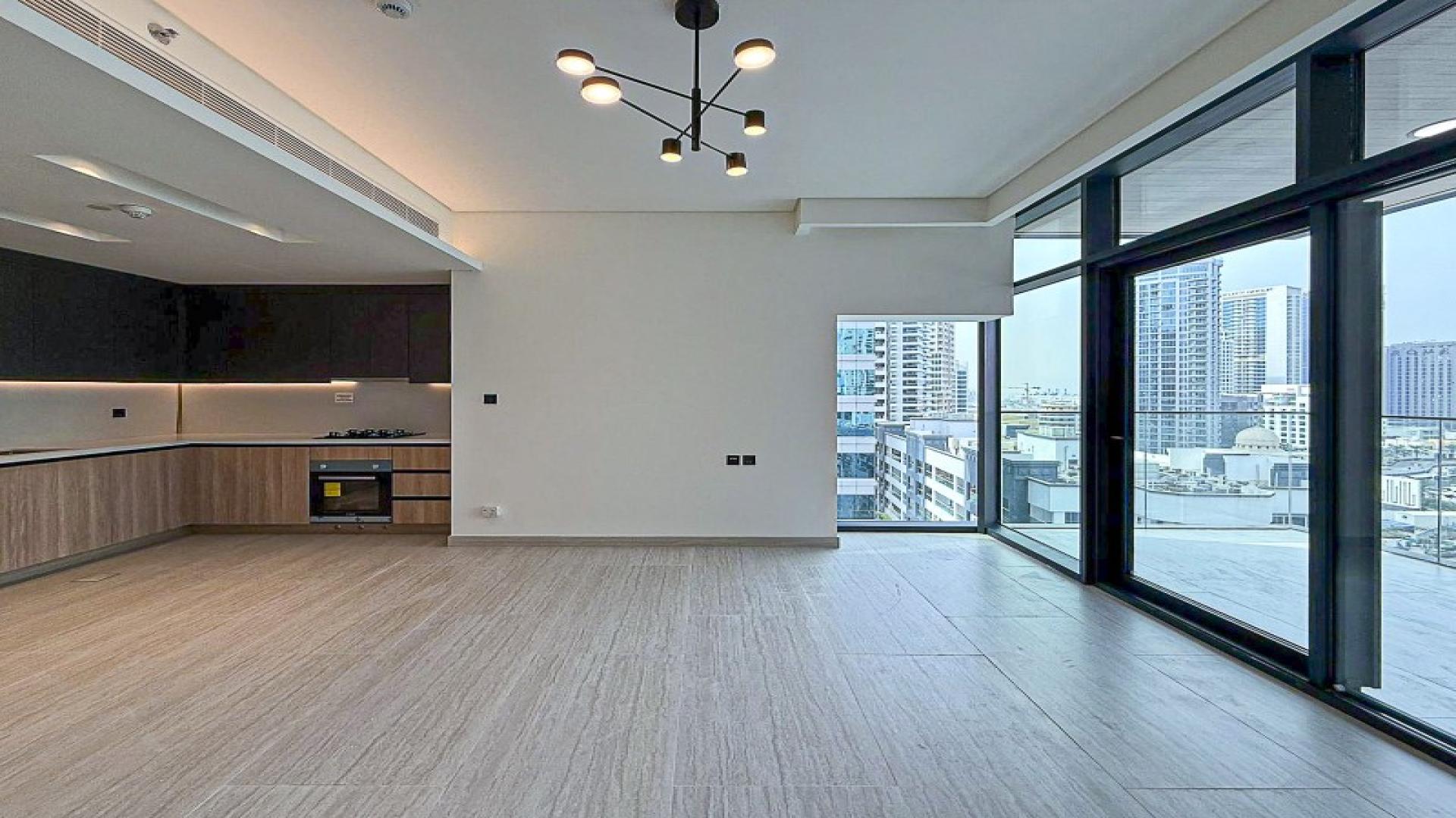 Modern kitchen and living area in Dubai Marina apartment for rent, Marina Living