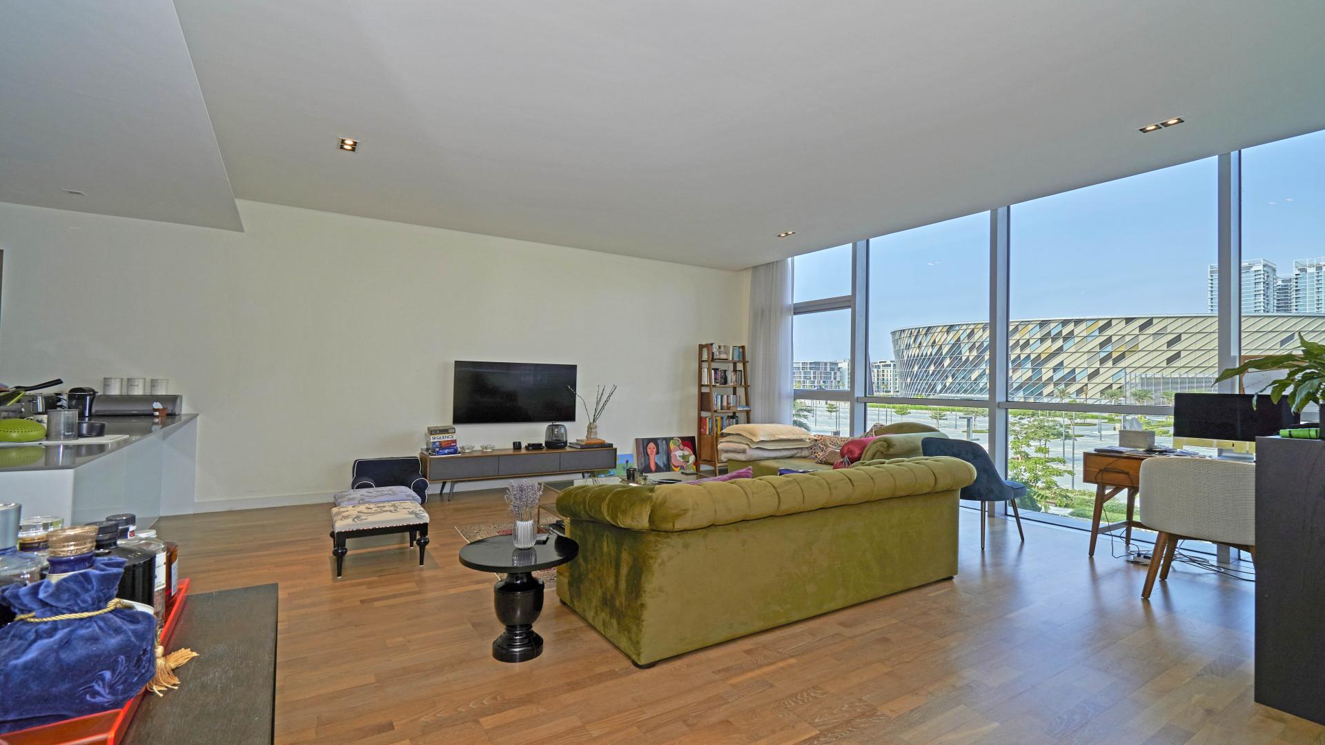Luxurious living room in City Walk apartment with skyline view and modern decor