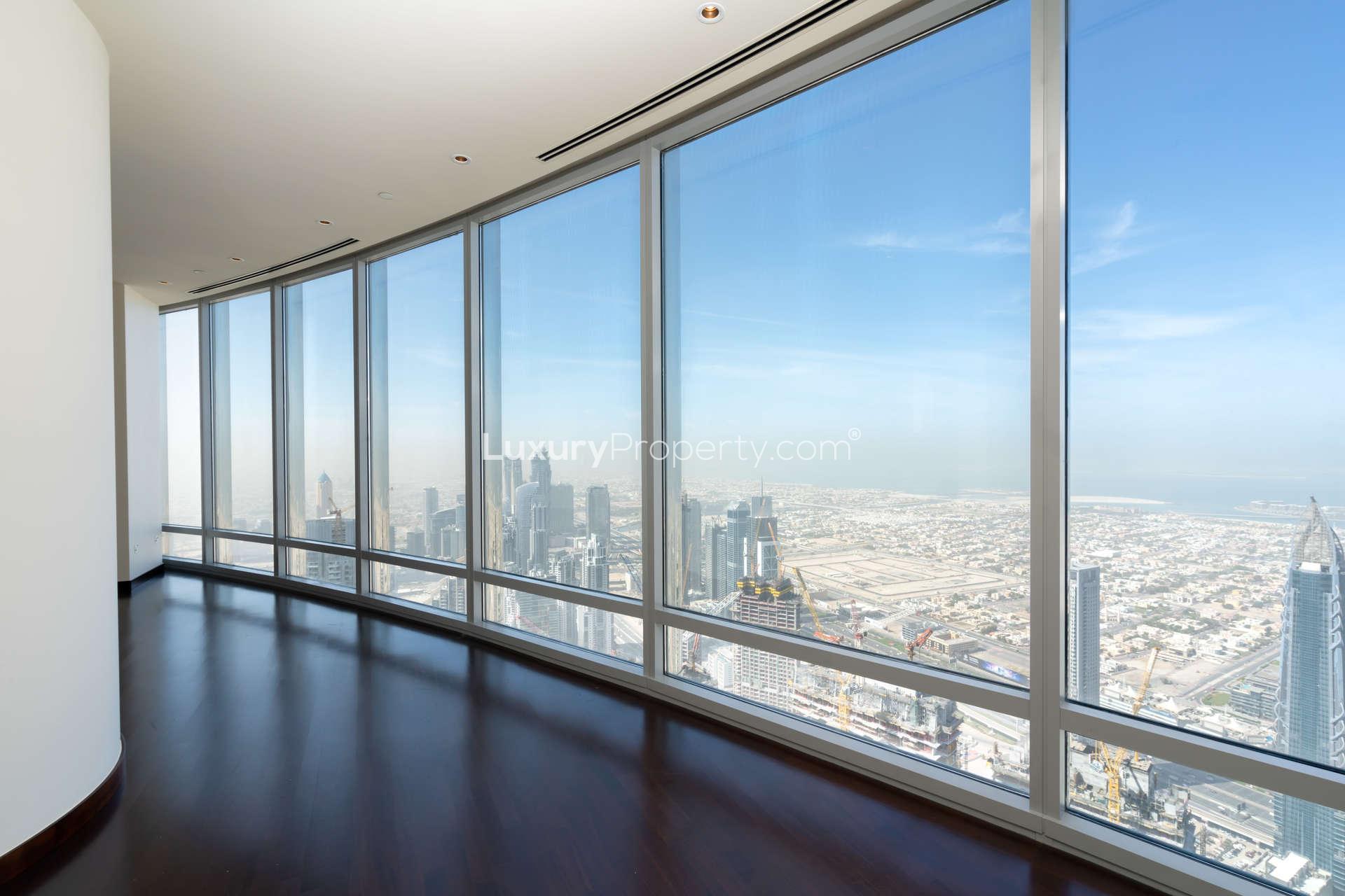 Light-filled apartment interior with stunning downtown Dubai skyline view, Burj Khalifa residence