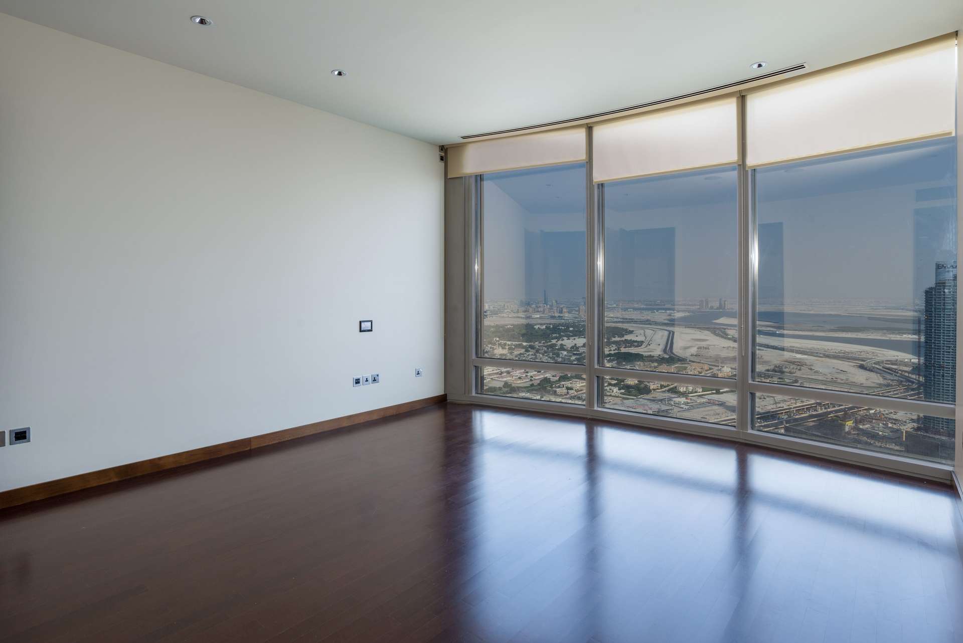 Hallway view in luxurious Burj Khalifa apartment with cityscape backdrop, Downtown Dubai