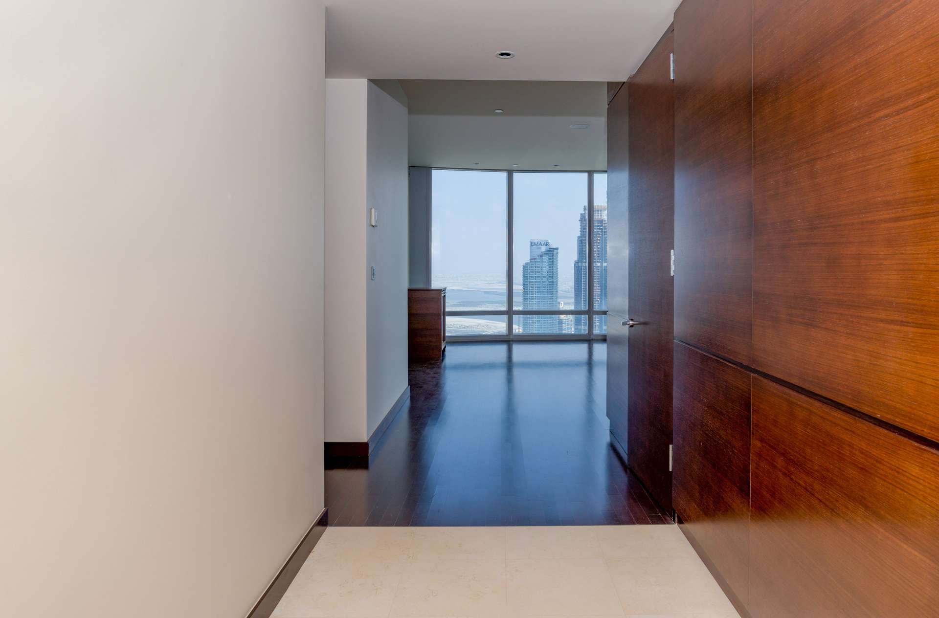 Luxurious hallway with wooden flooring in Burj Khalifa apartment, Downtown Dubai