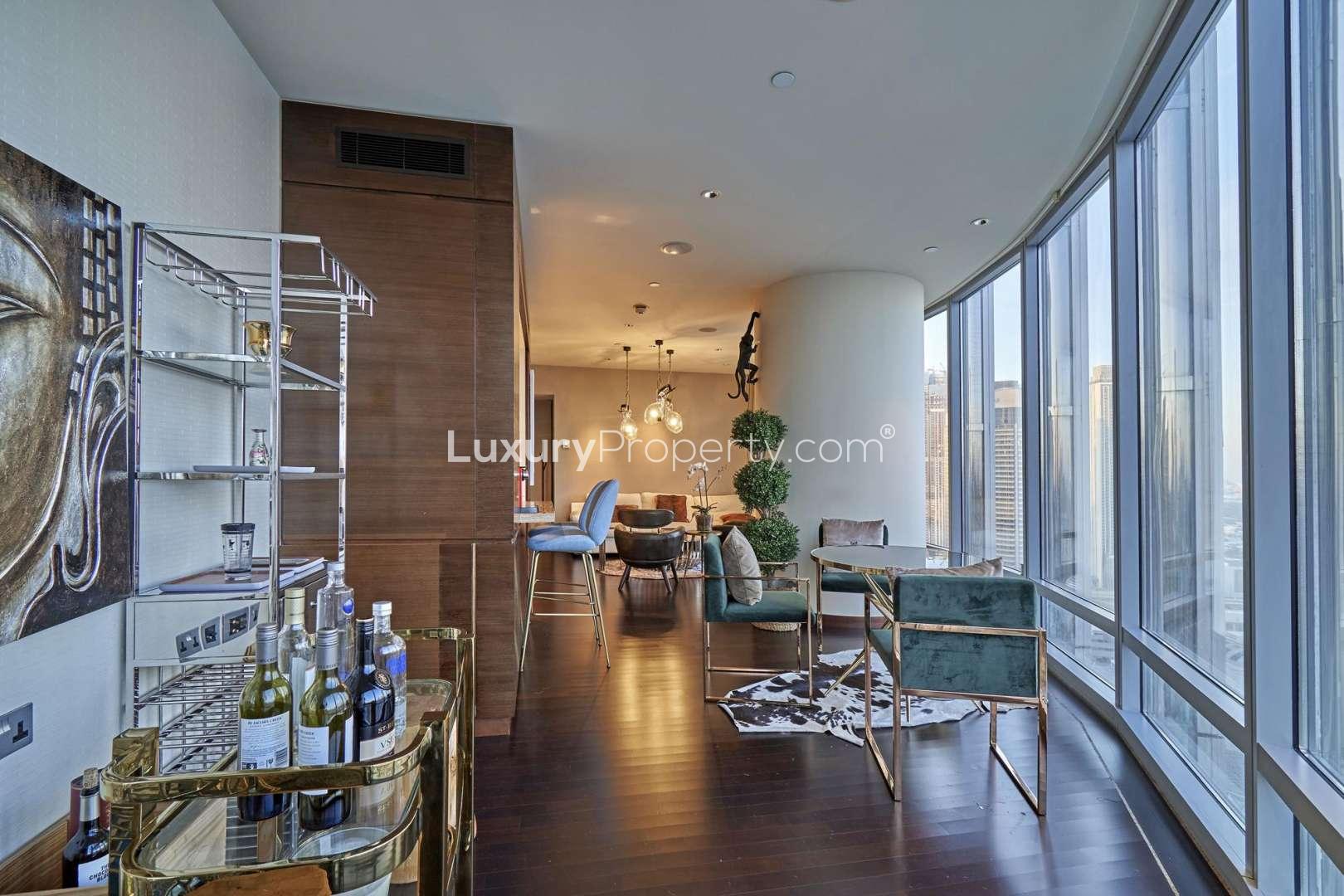 Spacious living room with panoramic city views in Burj Khalifa apartment, Downtown Dubai