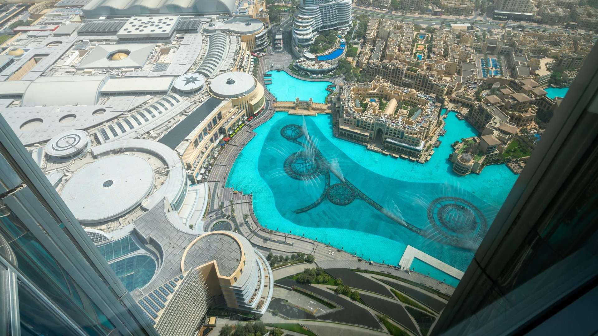 Empty living room with floor-to-ceiling windows in Burj Khalifa apartment, Downtown Dubai