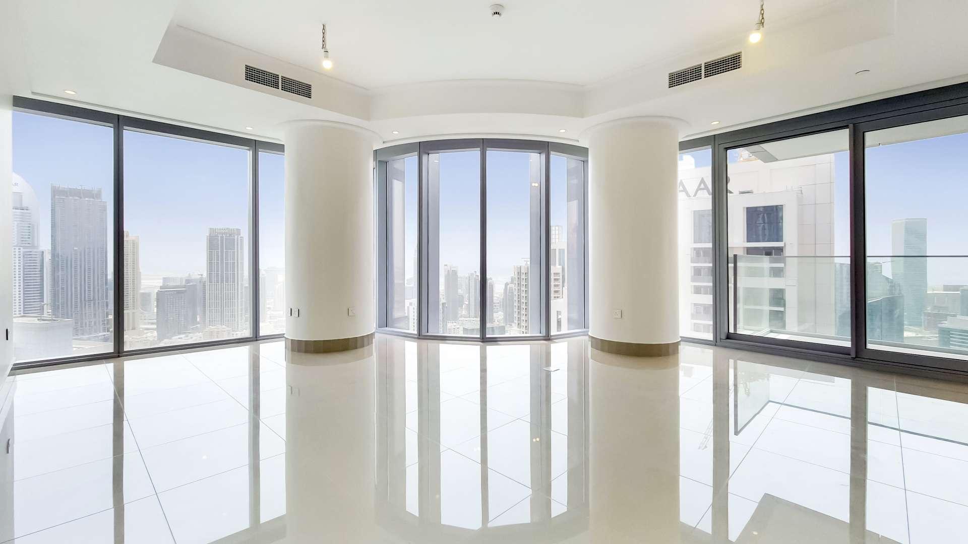 "Stunning view of Burj Khalifa and Dubai Fountain from Downtown Dubai apartment for rent.","Spacious apartment with Burj Khalifa and Dubai Fountain view in Downtown Dubai for rent.",Bright, modern apartment interior in Burj Khalifa Area, Downtown Dubai, with large window view