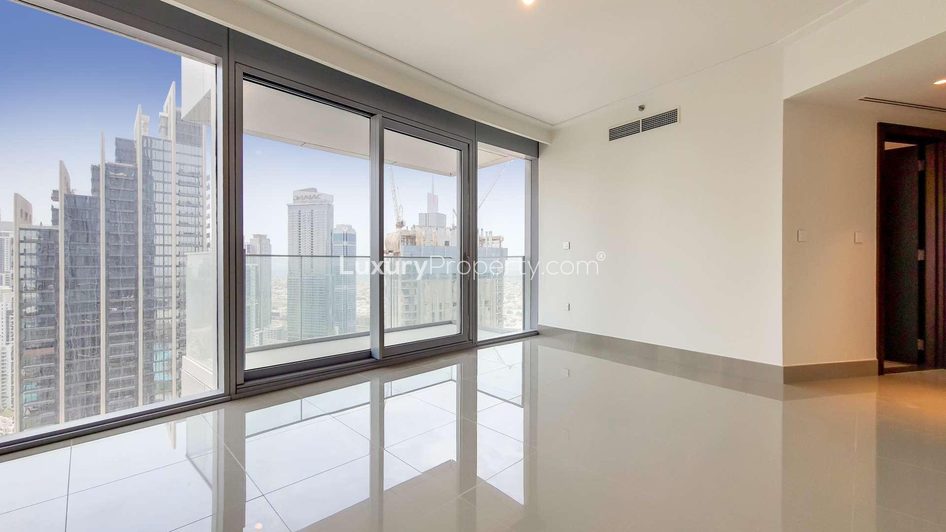 "Spacious living area in Opera Grand apartment, Downtown Dubai, with city views and modern design.",Spacious Opera Grand apartment with city view in Burj Khalifa Area, Downtown Dubai