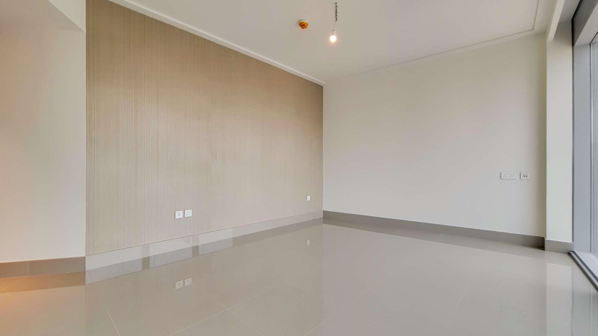 Empty living room in spacious Opera Grand apartment, Downtown Dubai, Burj Khalifa Area
