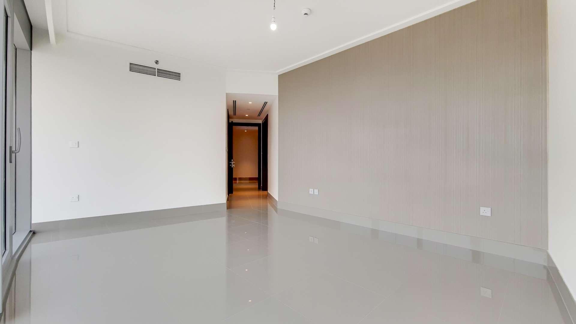 Spacious apartment with large windows, offering stunning views of Downtown Dubai skyline