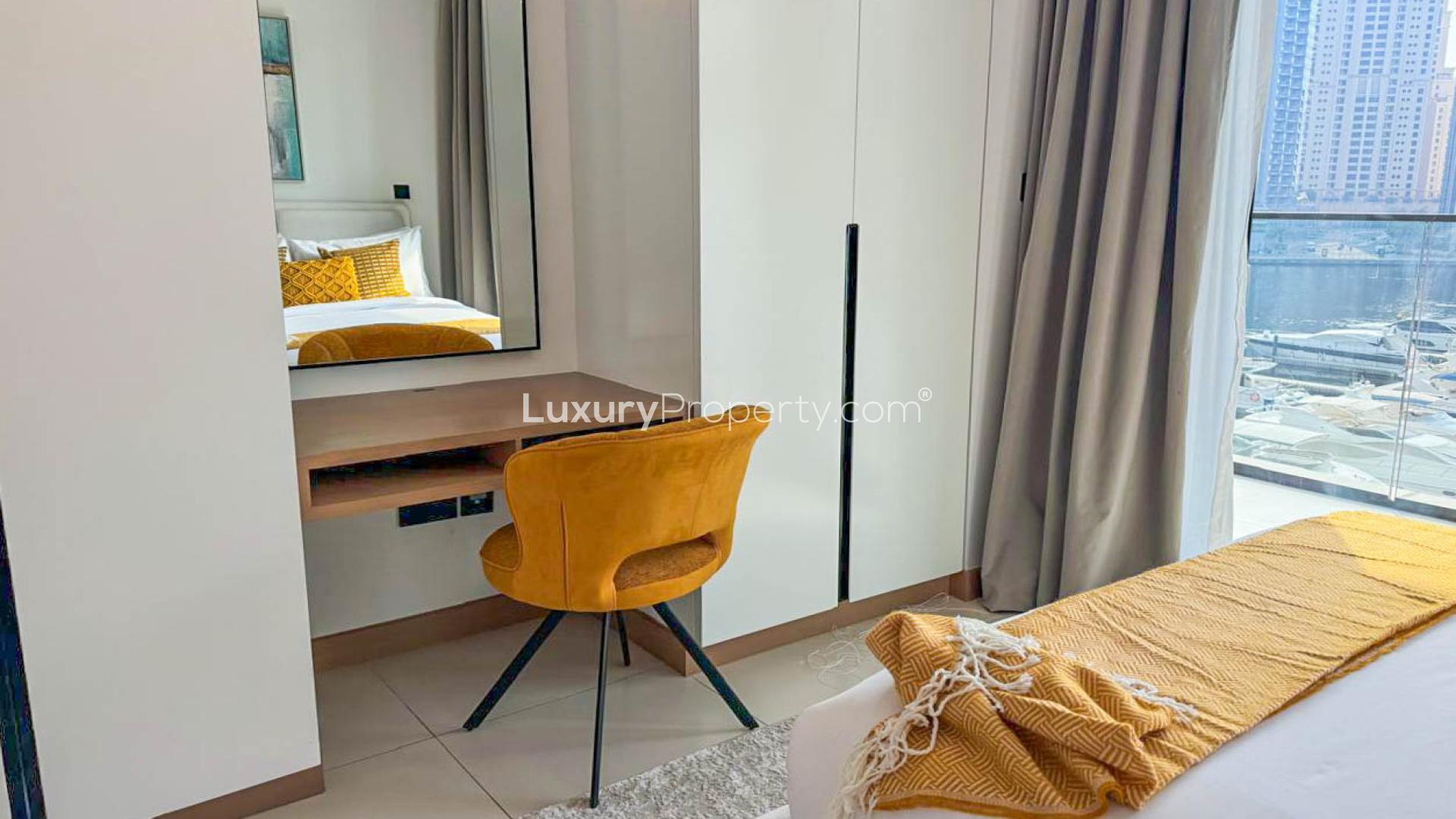 Furnished bedroom with marina view in Vida Residences Dubai Marina apartment for rent
