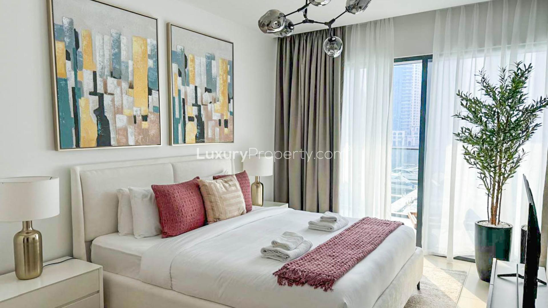 "Stylish living room with Marina view in fully furnished Dubai Marina apartment for rent.",Fully furnished bedroom with marina view in Vida Residences, Dubai Marina apartment for rent