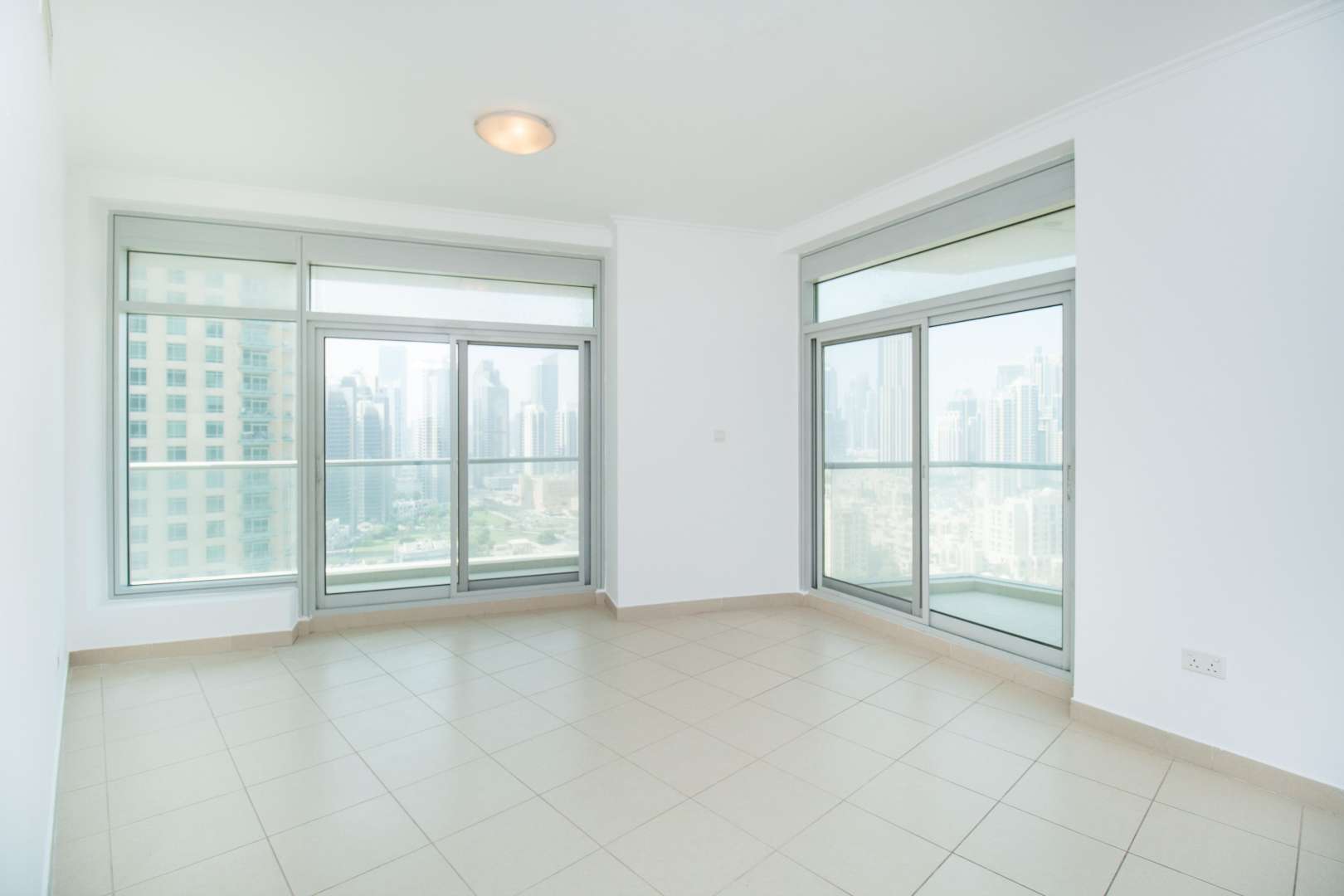 Spacious living room with Burj Khalifa views in Downtown Dubai apartment for rent
