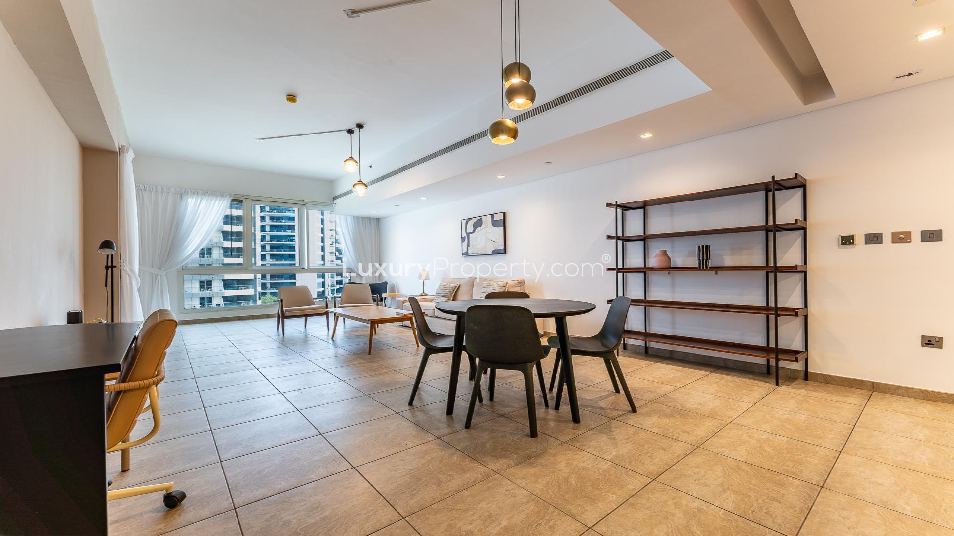 Modern living room in Marina Residences apartment, Palm Jumeirah, with stylish furniture and decor