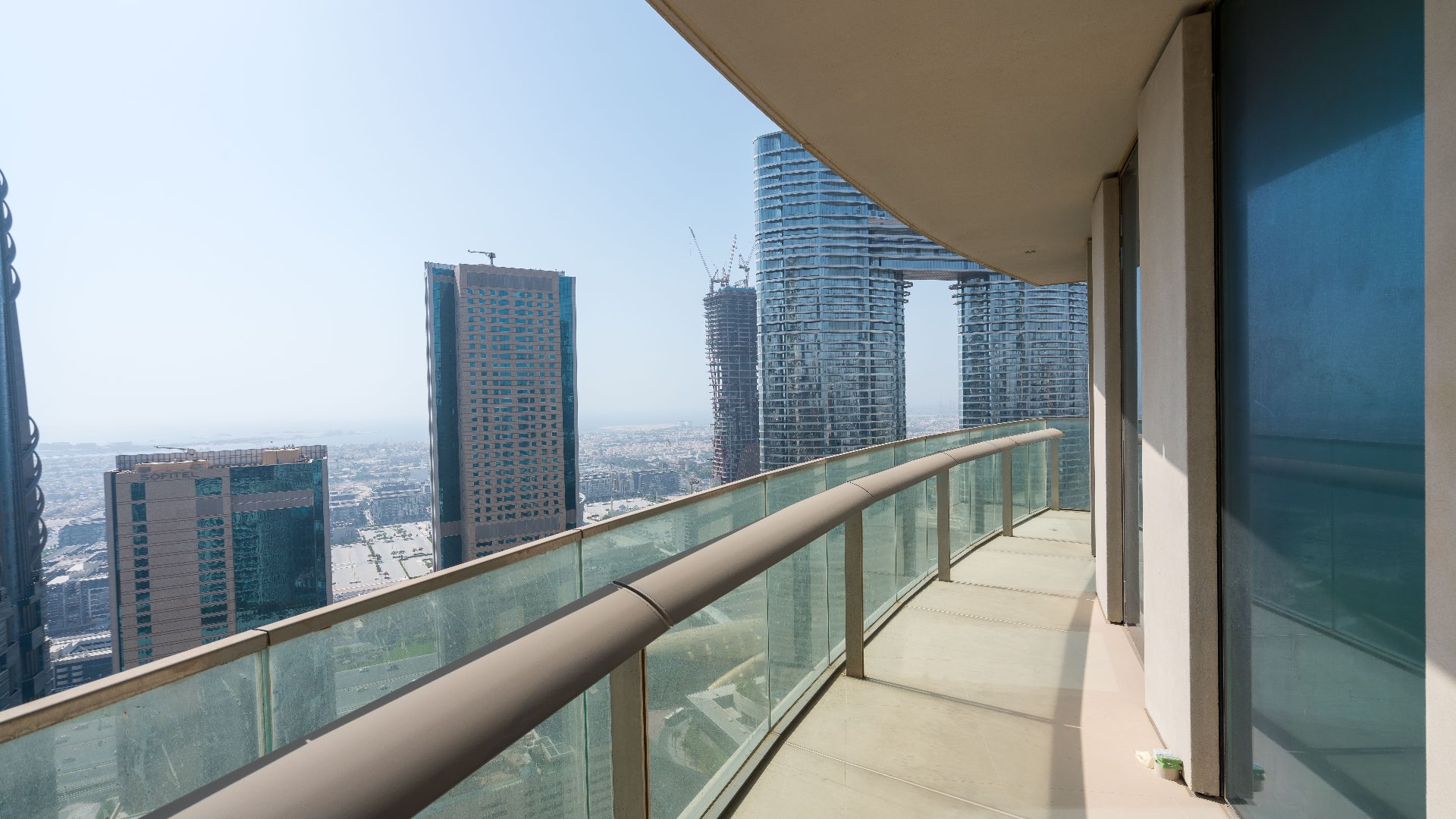 Balcony view from 2-bedroom apartment in Burj Vista, Downtown Dubai, showing city skyline