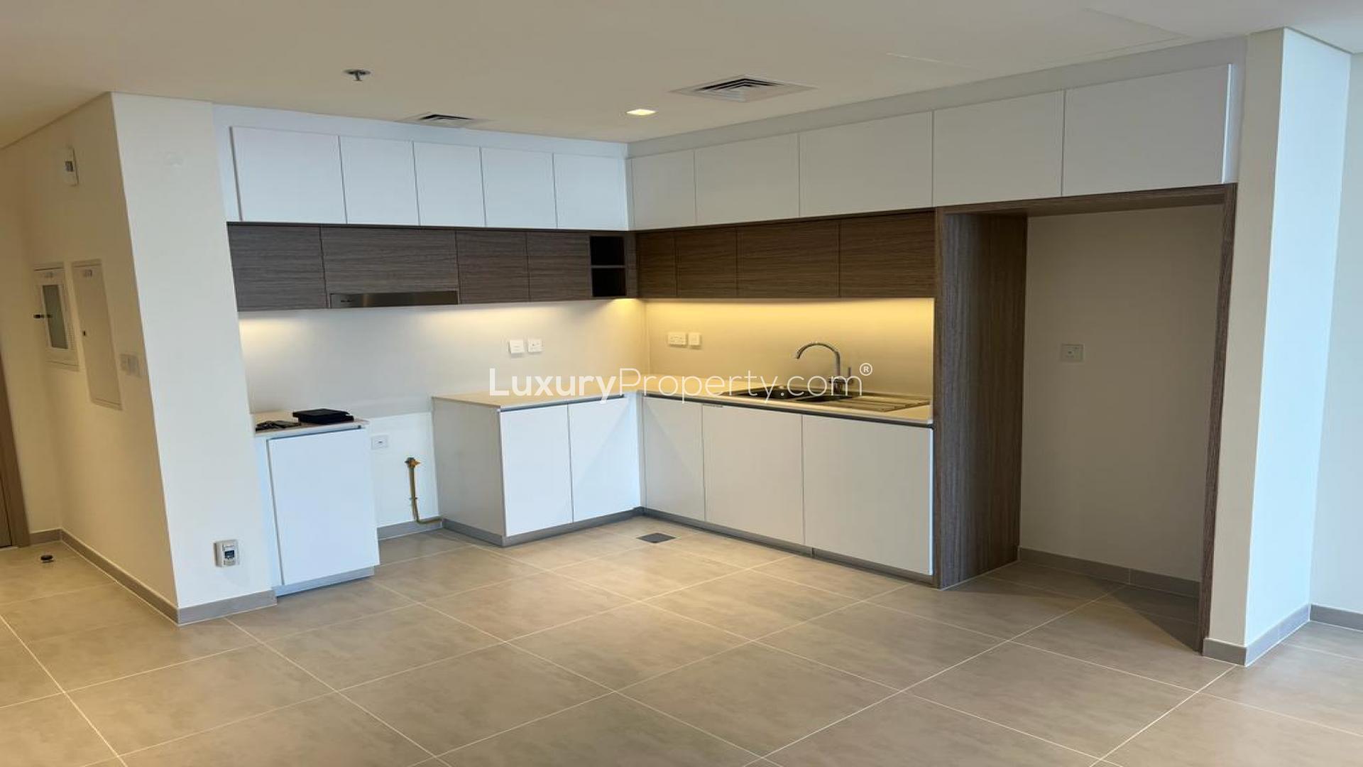 "Stunning Dubai Creek view from Creek Edge apartment, available for rent in Dubai Creek Harbour.",Modern kitchen in freshly completed Dubai Creek Harbour apartment for rent, Creek Edge