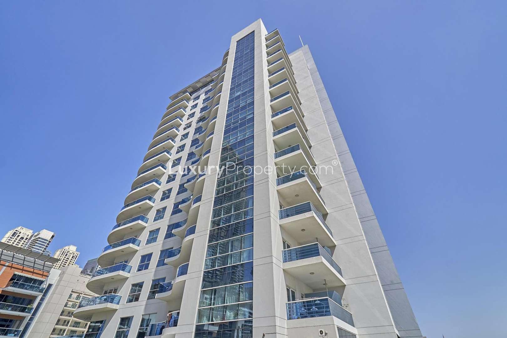 Rooftop pool view from Cascades Tower apartment, Dubai Marina skyline in background