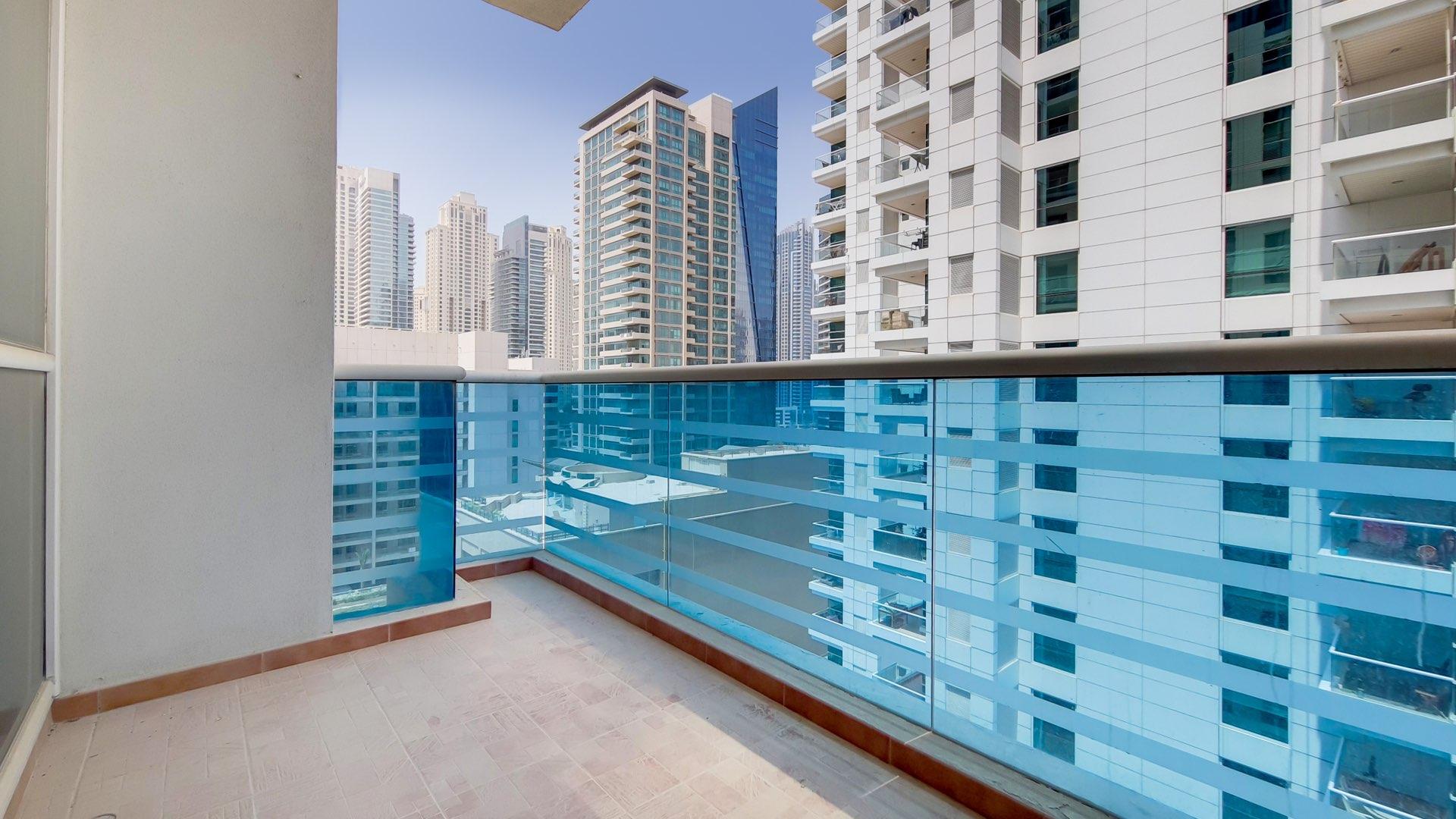 Two-bedroom apartment interior in Cascades Tower, Dubai Marina, with open kitchen and large windows