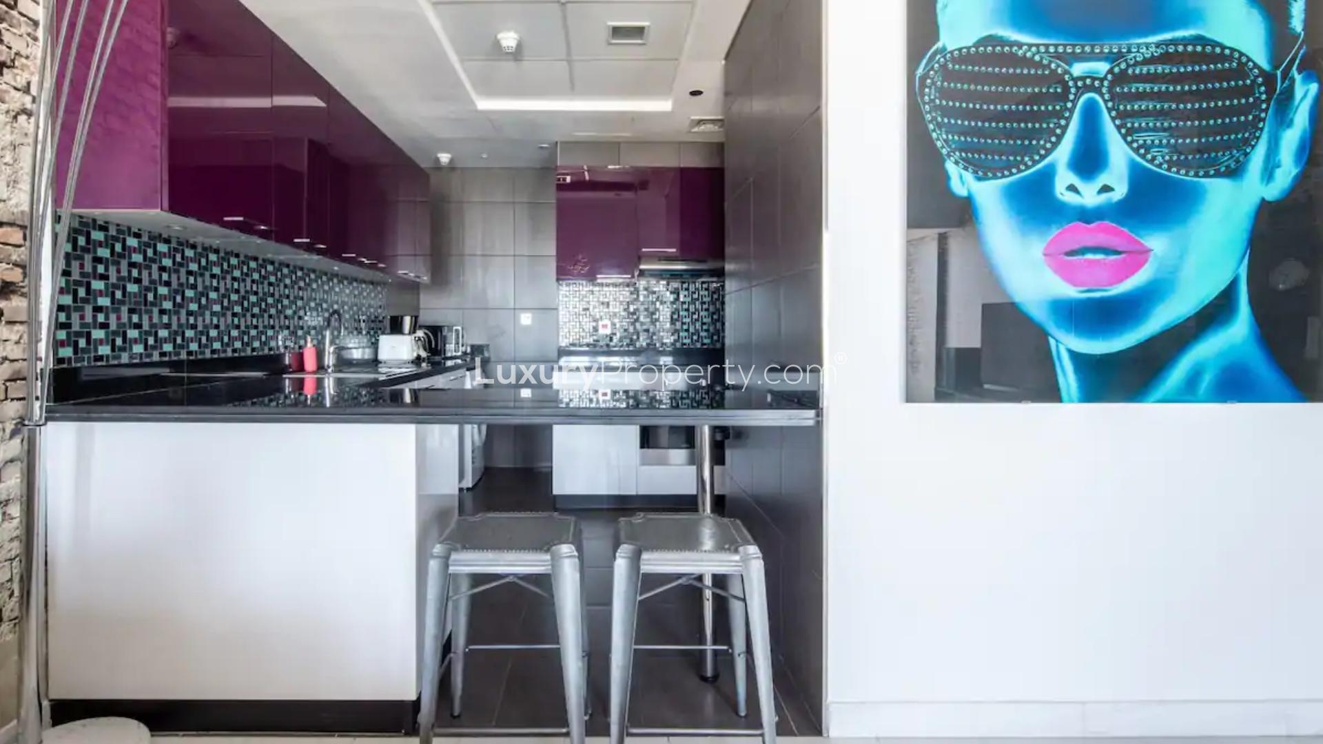 Modern living room in Cayan Tower apartment, Dubai Marina, with stylish decor and open layout