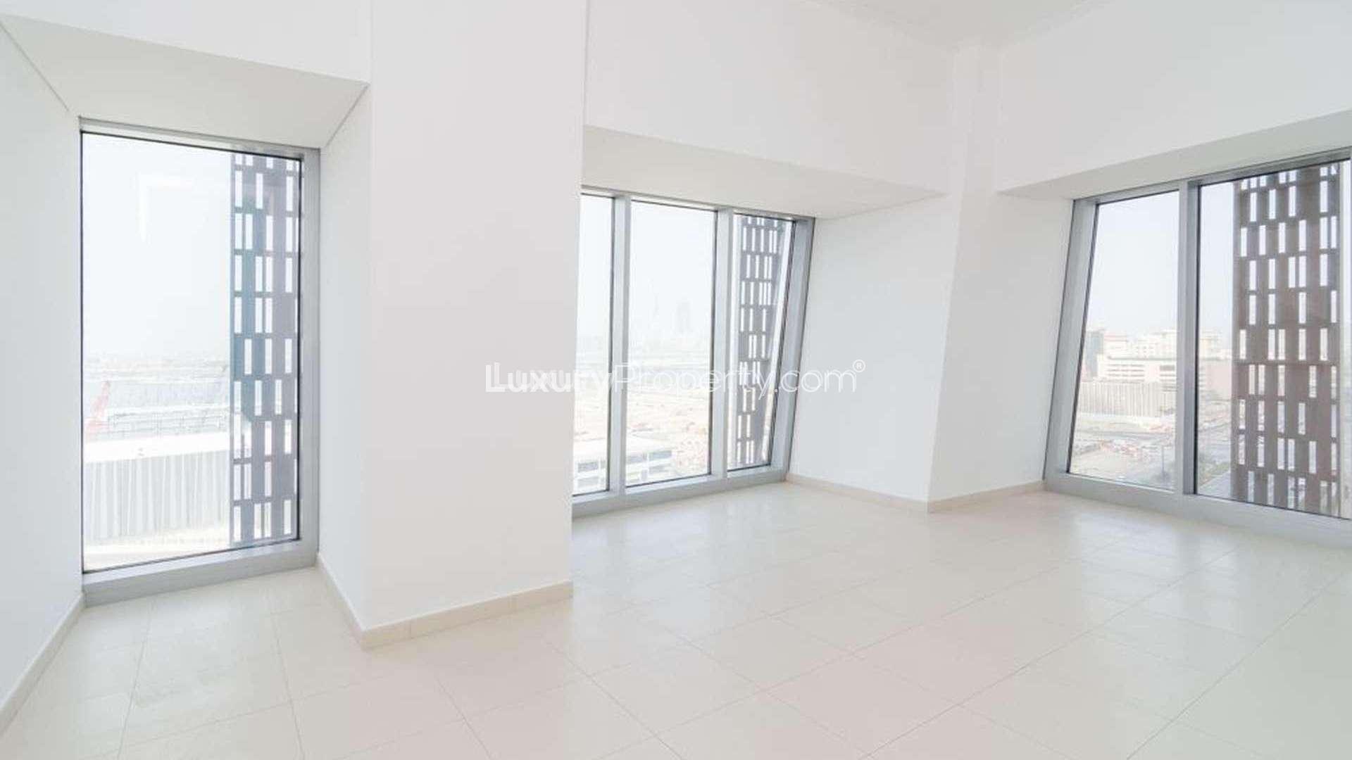 Aerial view of Dubai Marina skyline and waterfront near Cayan Tower apartment for rent