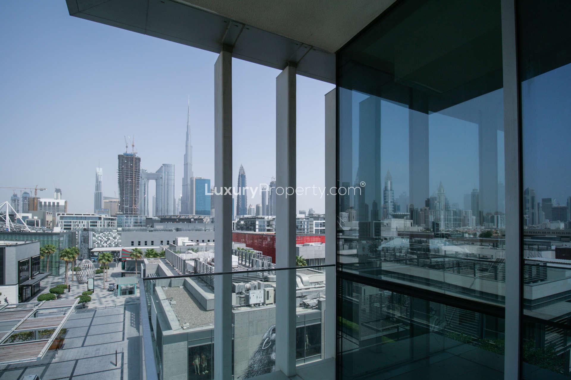 "Spacious balcony view from 2-bedroom apartment in City Walk, Building 24, Dubai.",Balcony view from 2-bedroom apartment in City Walk, Dubai, overlooking skyline and community
