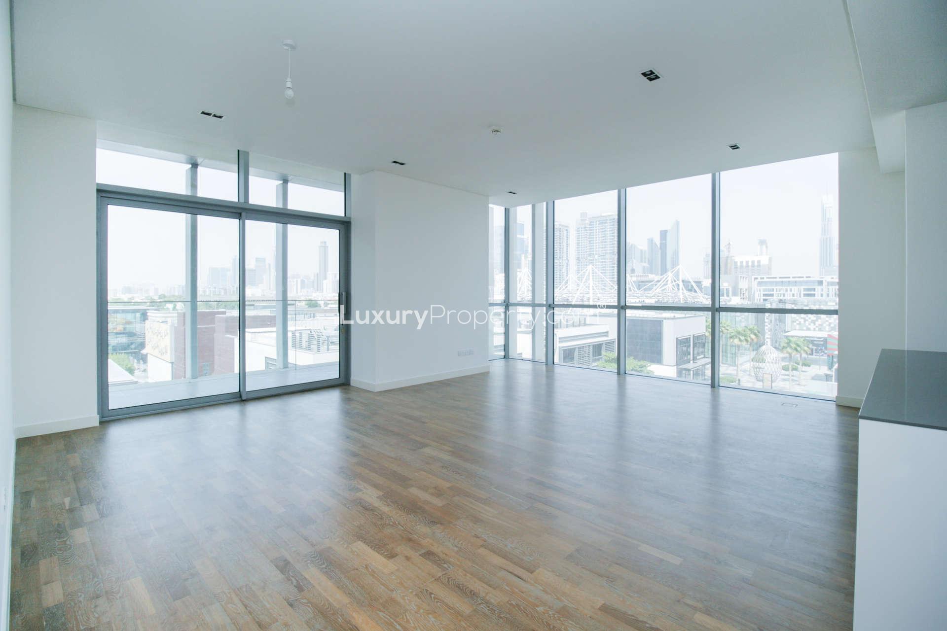 Contemporary open-plan kitchen and living area in City Walk apartment, Dubai, with skyline views