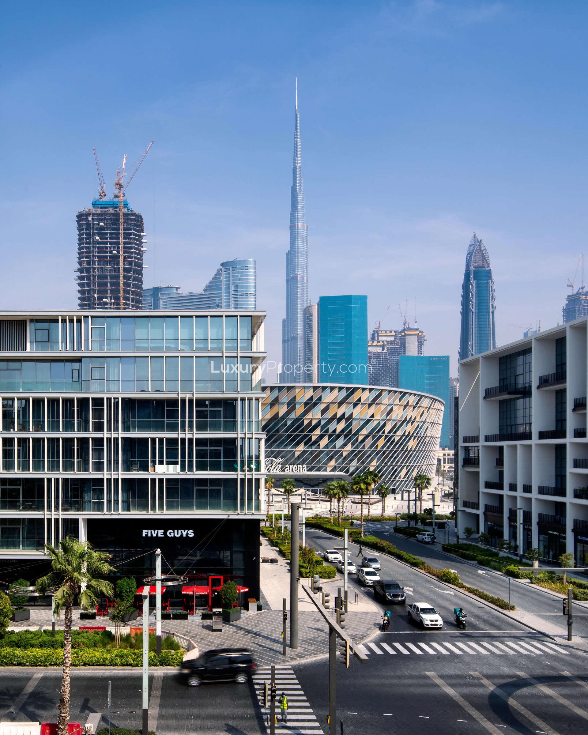 Spacious living room in City Walk apartment with modern decor and large windows