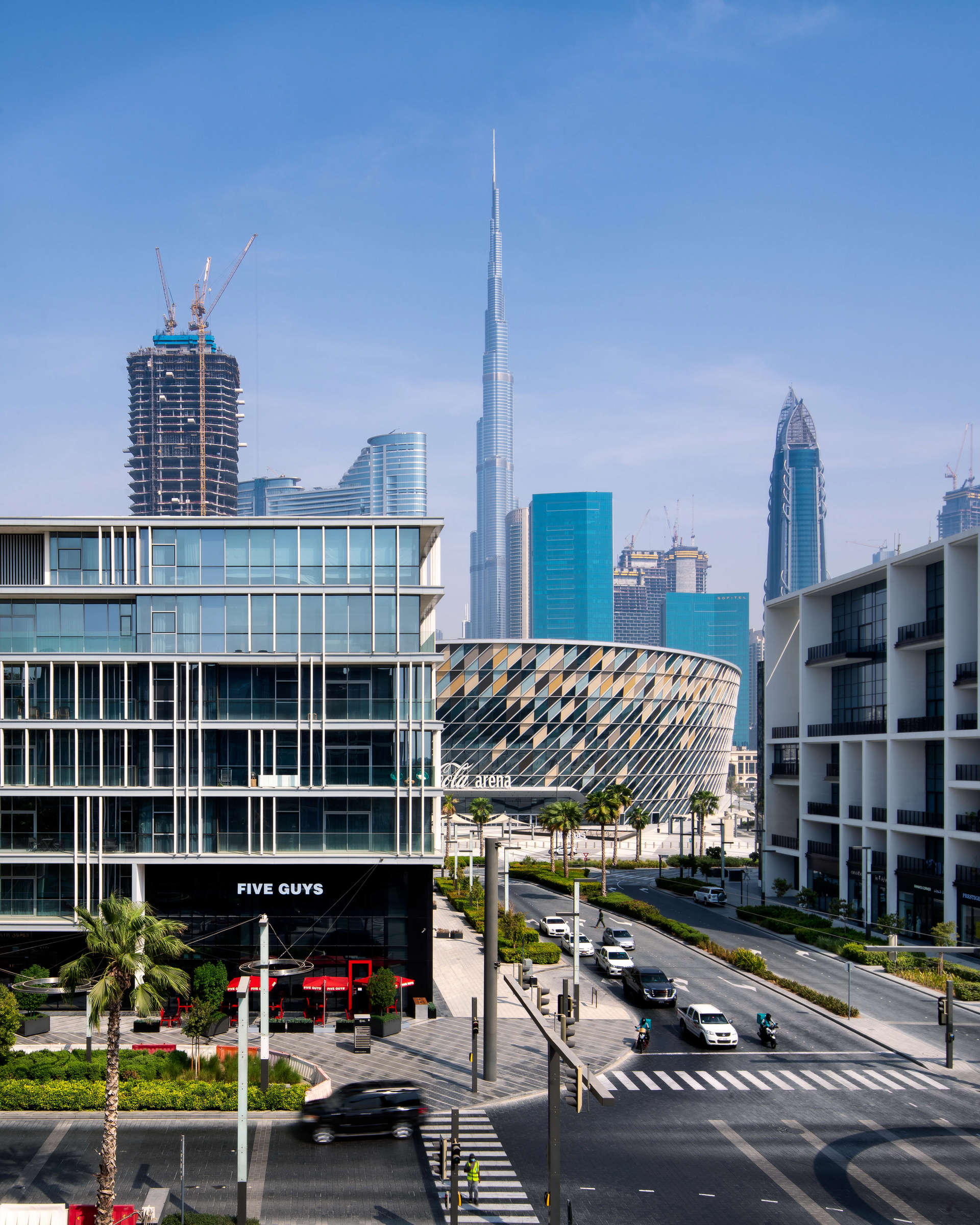 Spacious living room in City Walk apartment with modern decor and large windows